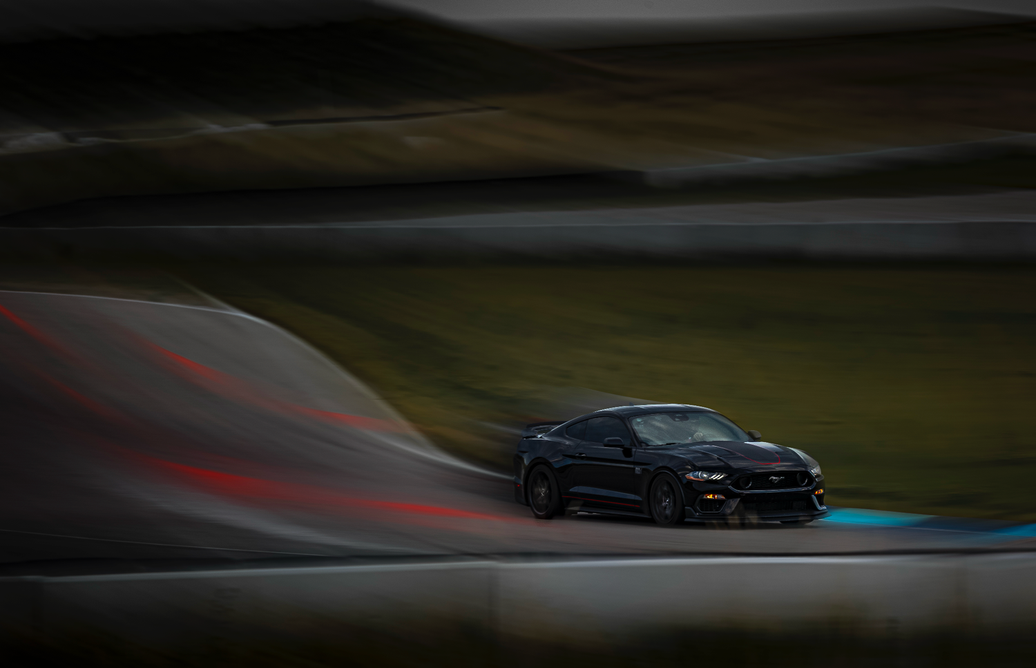 Black mustang on Rocky Mountain Motorsports Track