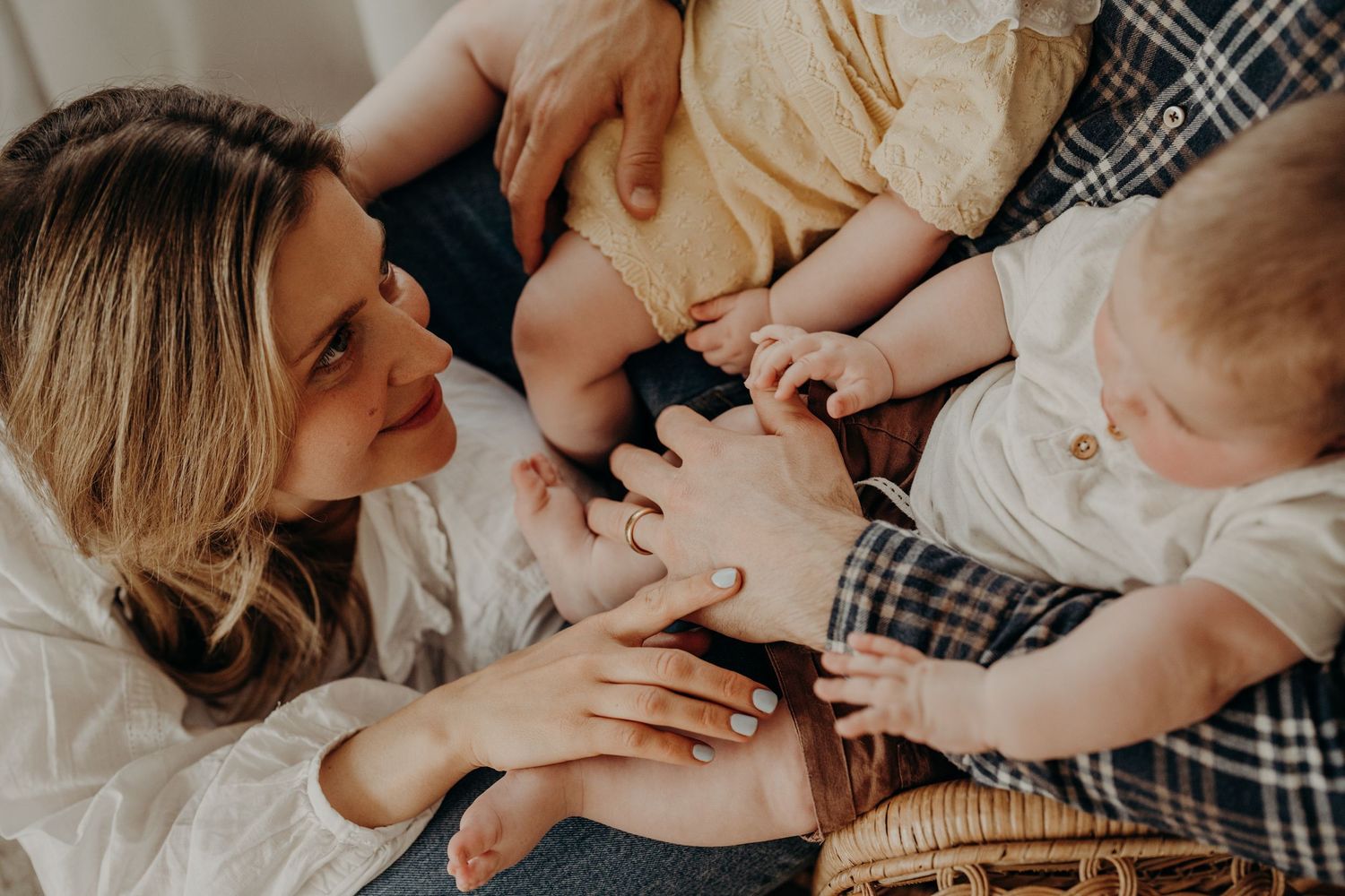Intimate family moment captured in warm indoor lighting.