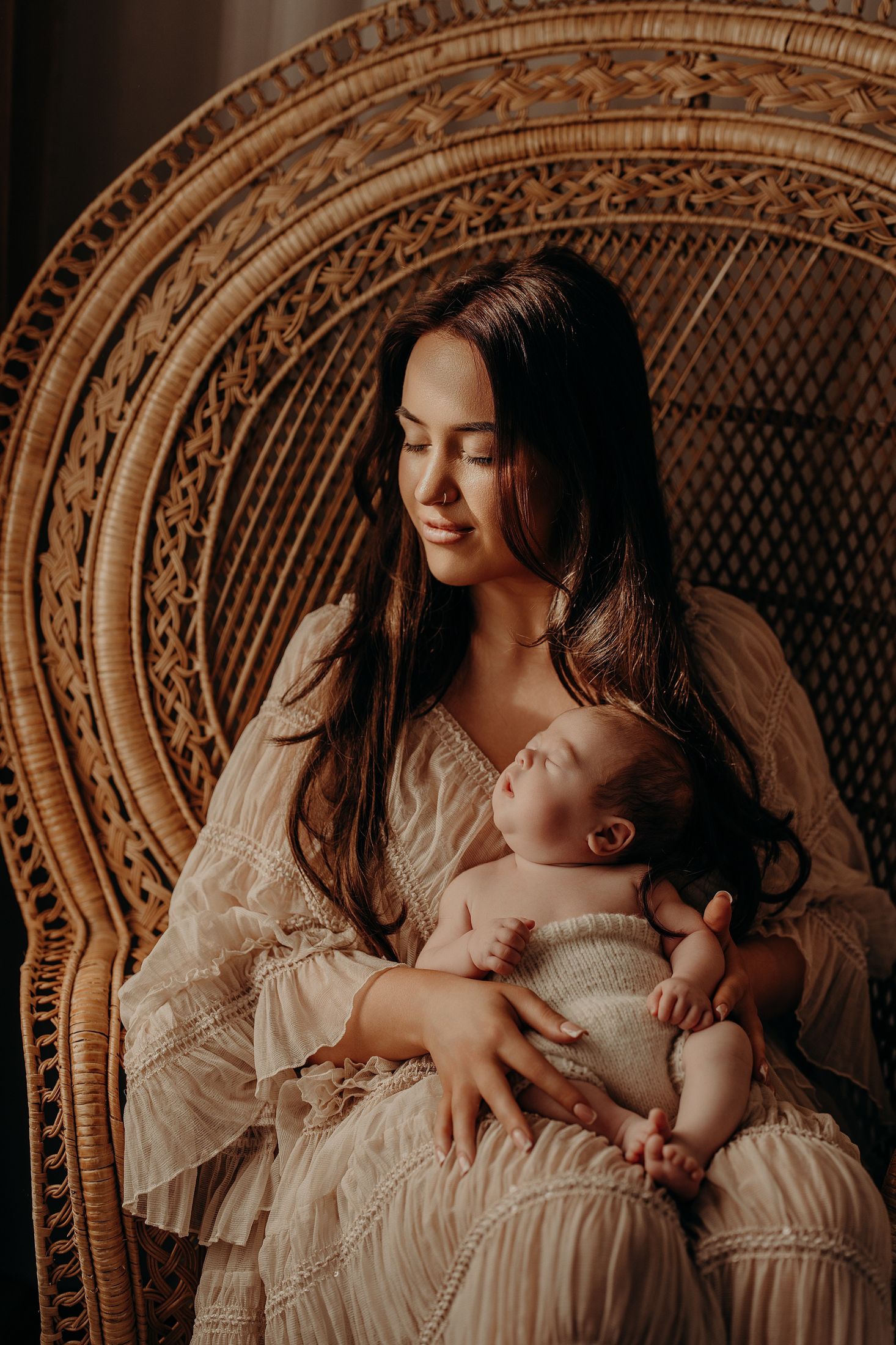 Intimate series of photographs showing tender moments between mother and nursing baby in a studio, natural newborn photography Dublin