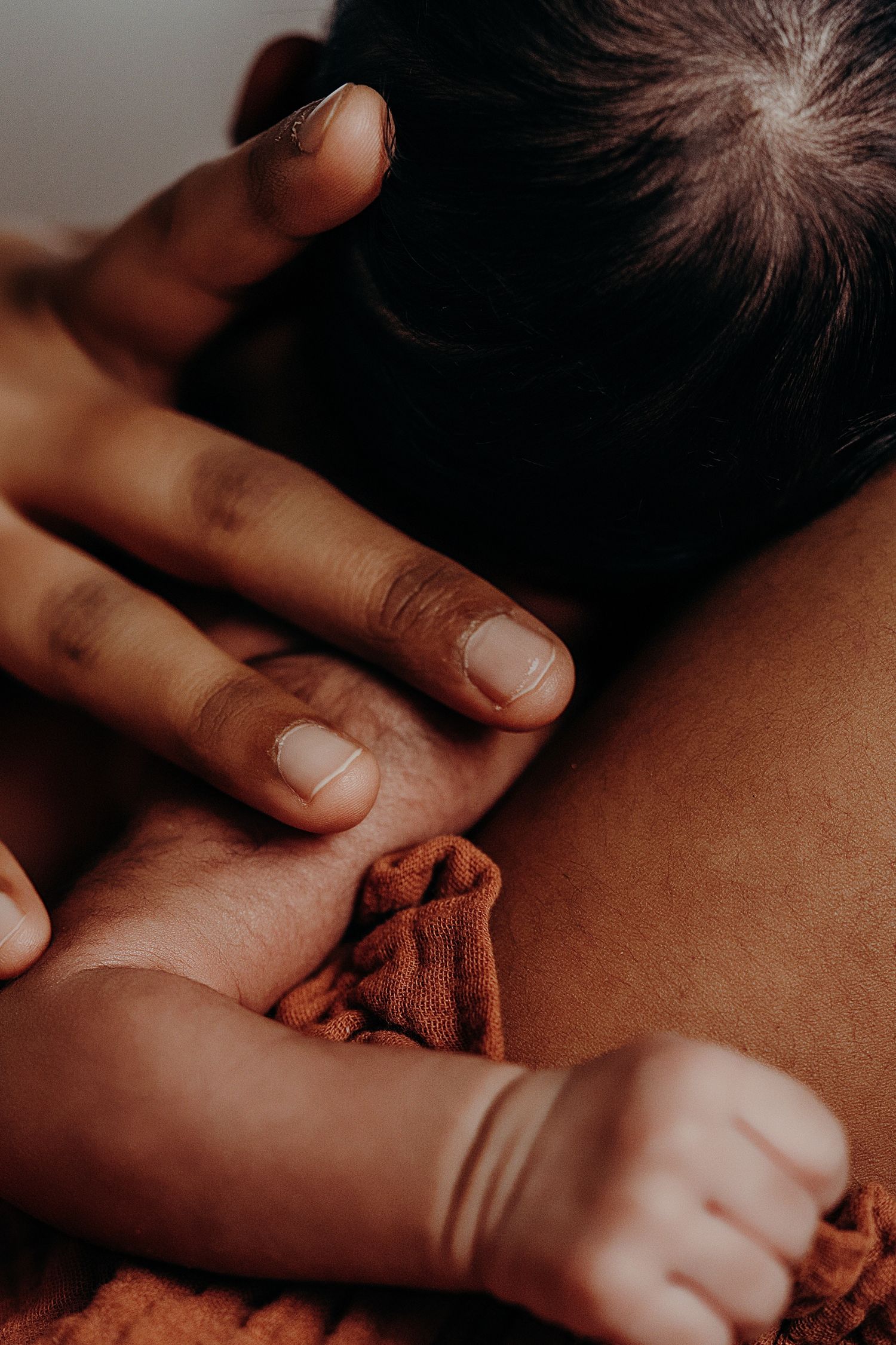 Close-up view of caring hands providing gentle touch and comfort.