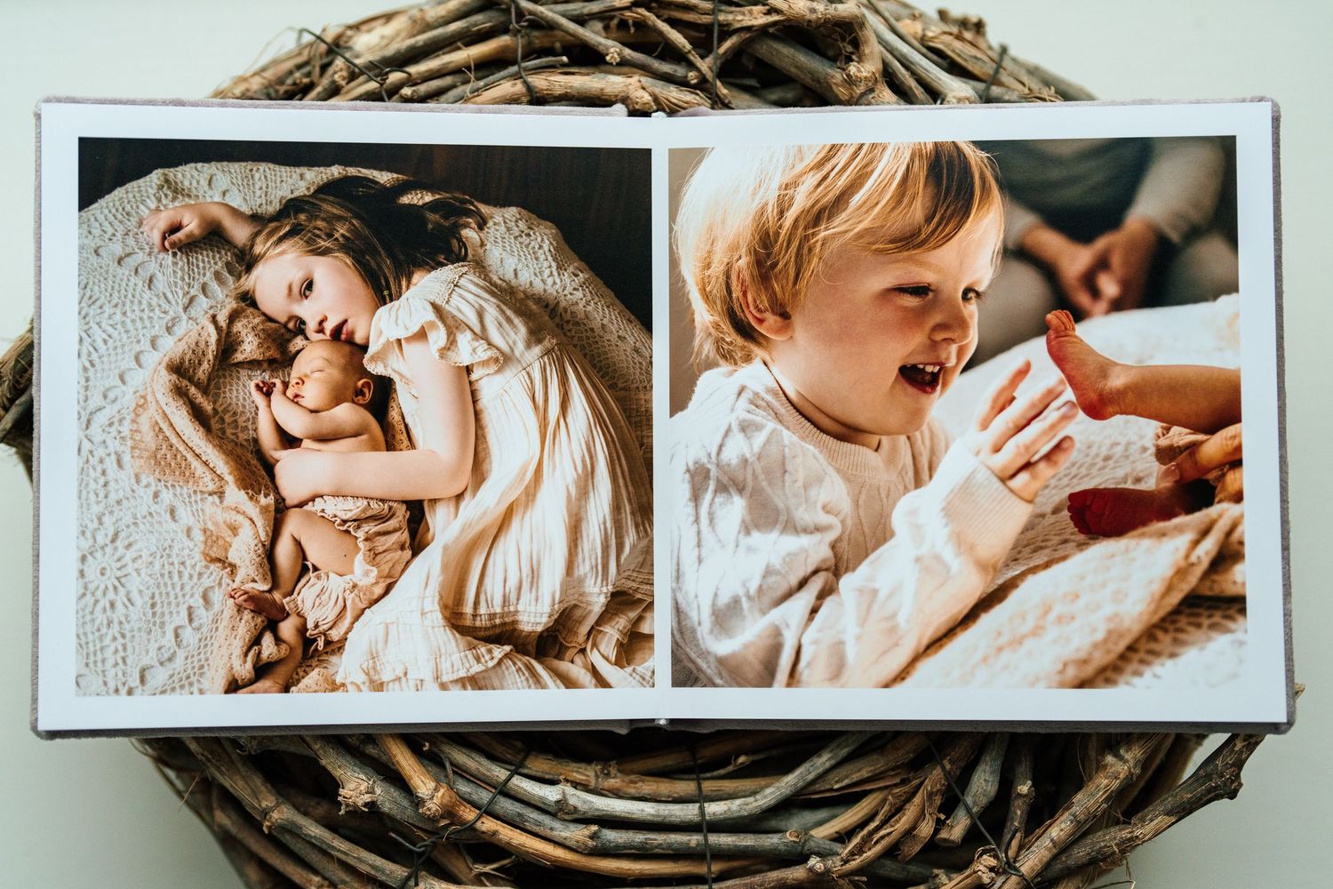 Photography album layout showing intimate lifestyle moments in black and white prints.