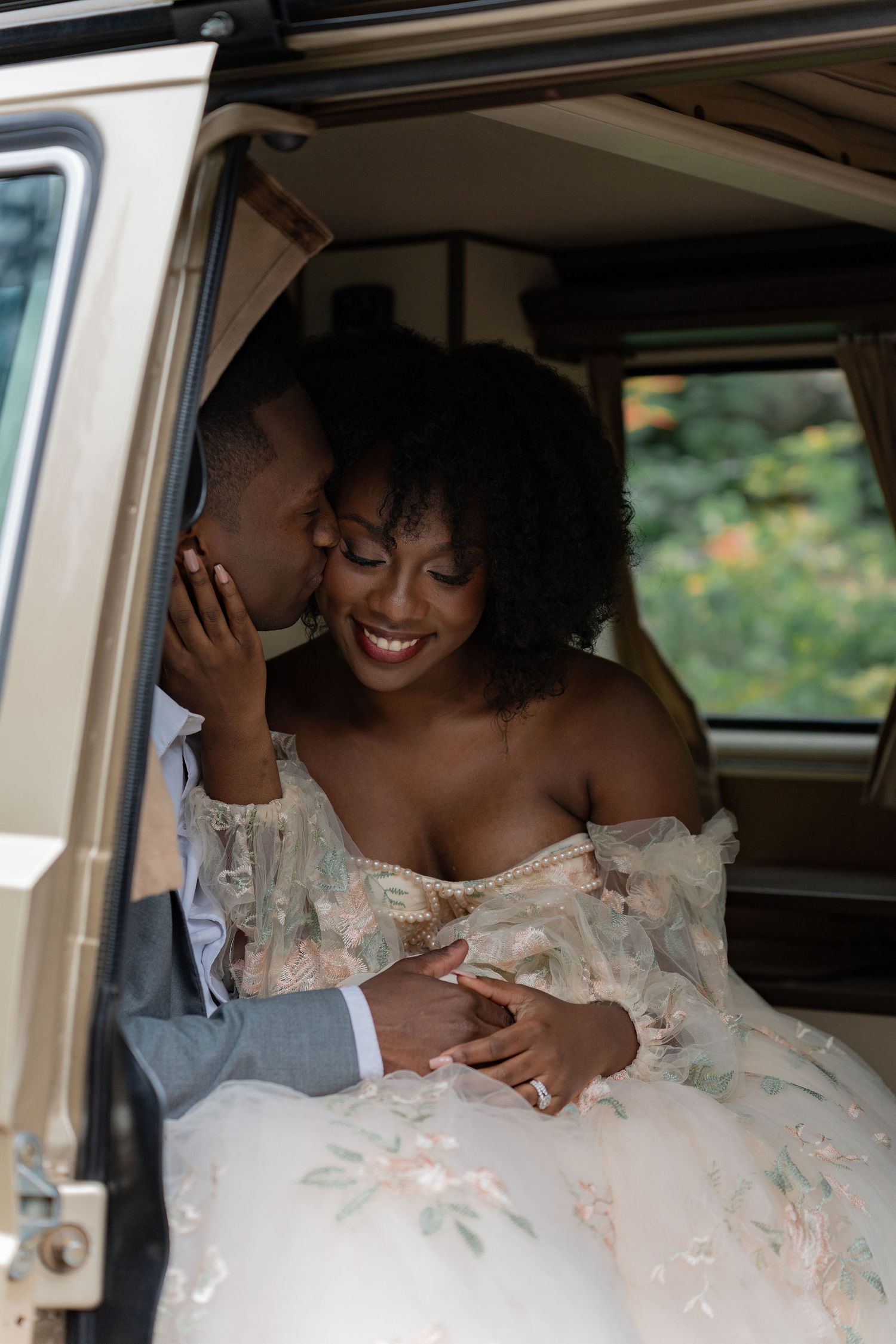 Candid moments of joy and laughter captured inside a vintage wedding car.