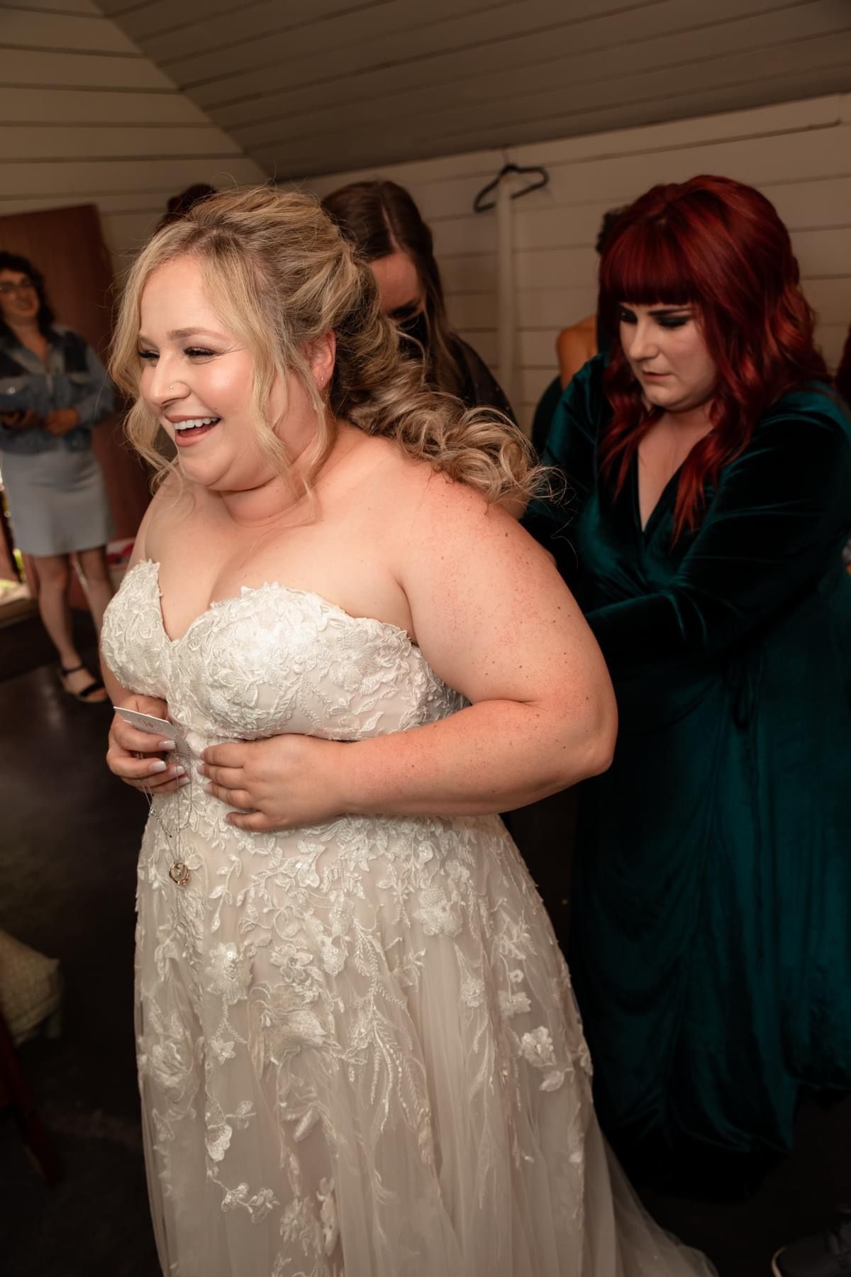 Emotional moments shared between wedding attendees during reception celebrations.