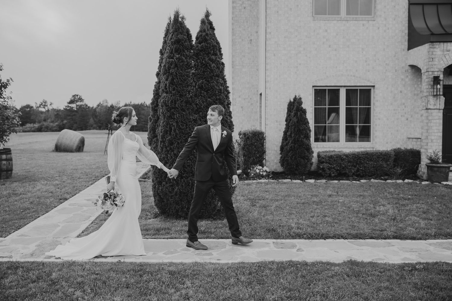 Black and white photo of a newly married couple after their wedding in Central Arkansas.