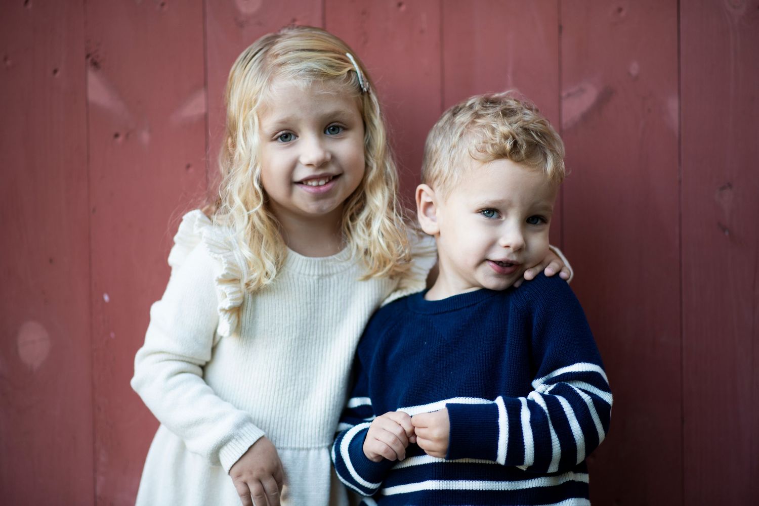 Brother and sister smile for close up portrait at Croft Farm in Cherry Hill, New Jersey.