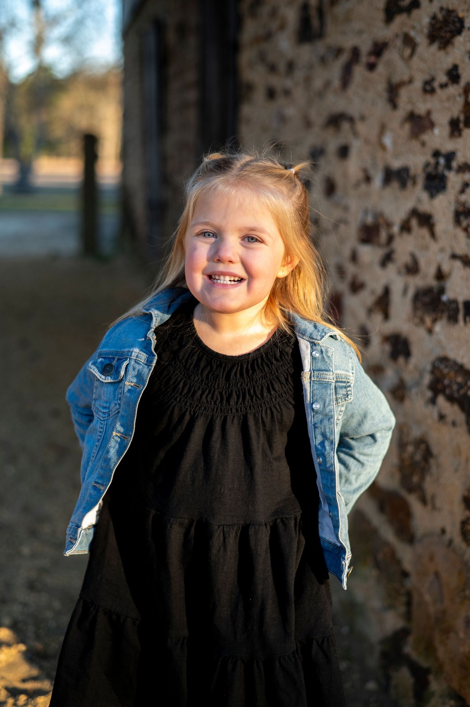 Little girl poses for portrait at Batsto Historic Village.