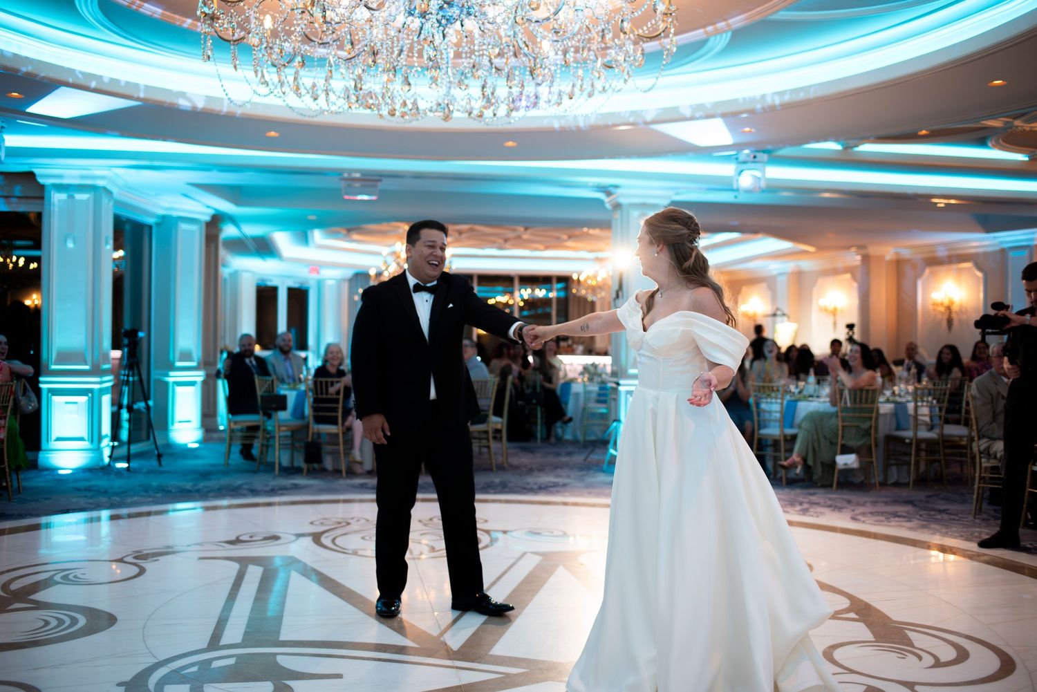 Bride and groom enjoy their first dance during wedding reception at The Mansion in Voorhees, New Jersey.