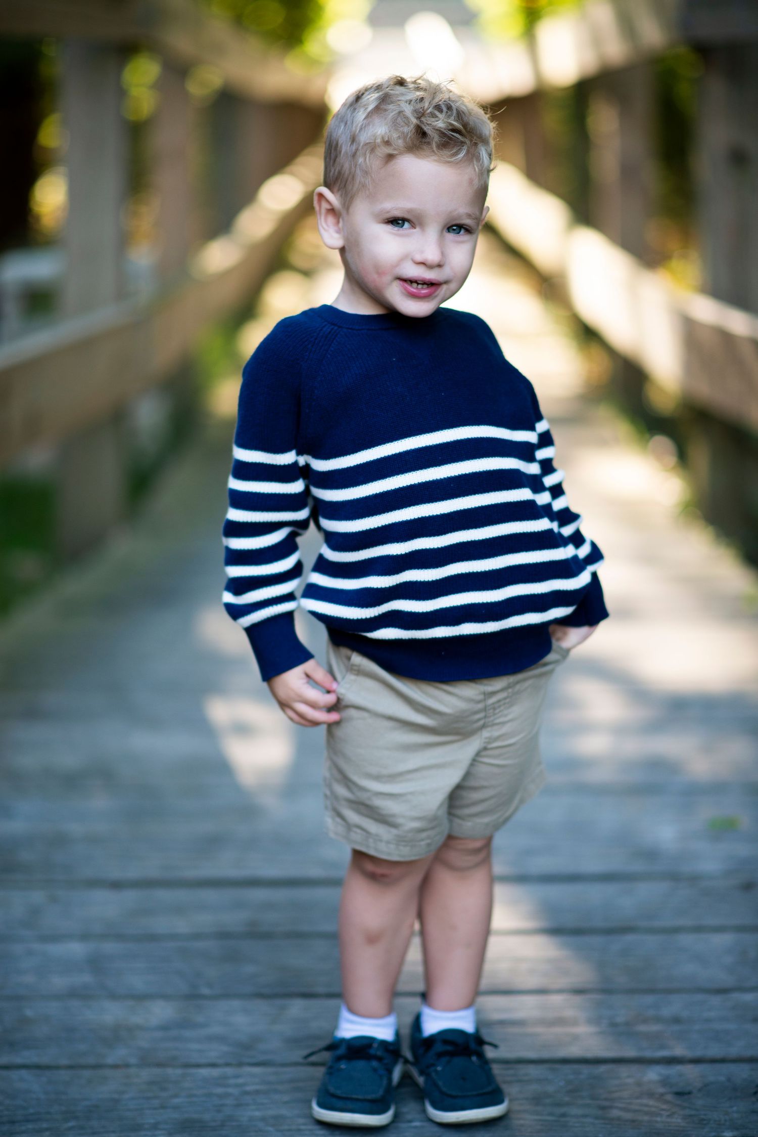 Portrait of young boy on a bridge at Croft Farm in Cherry Hill, NJ.