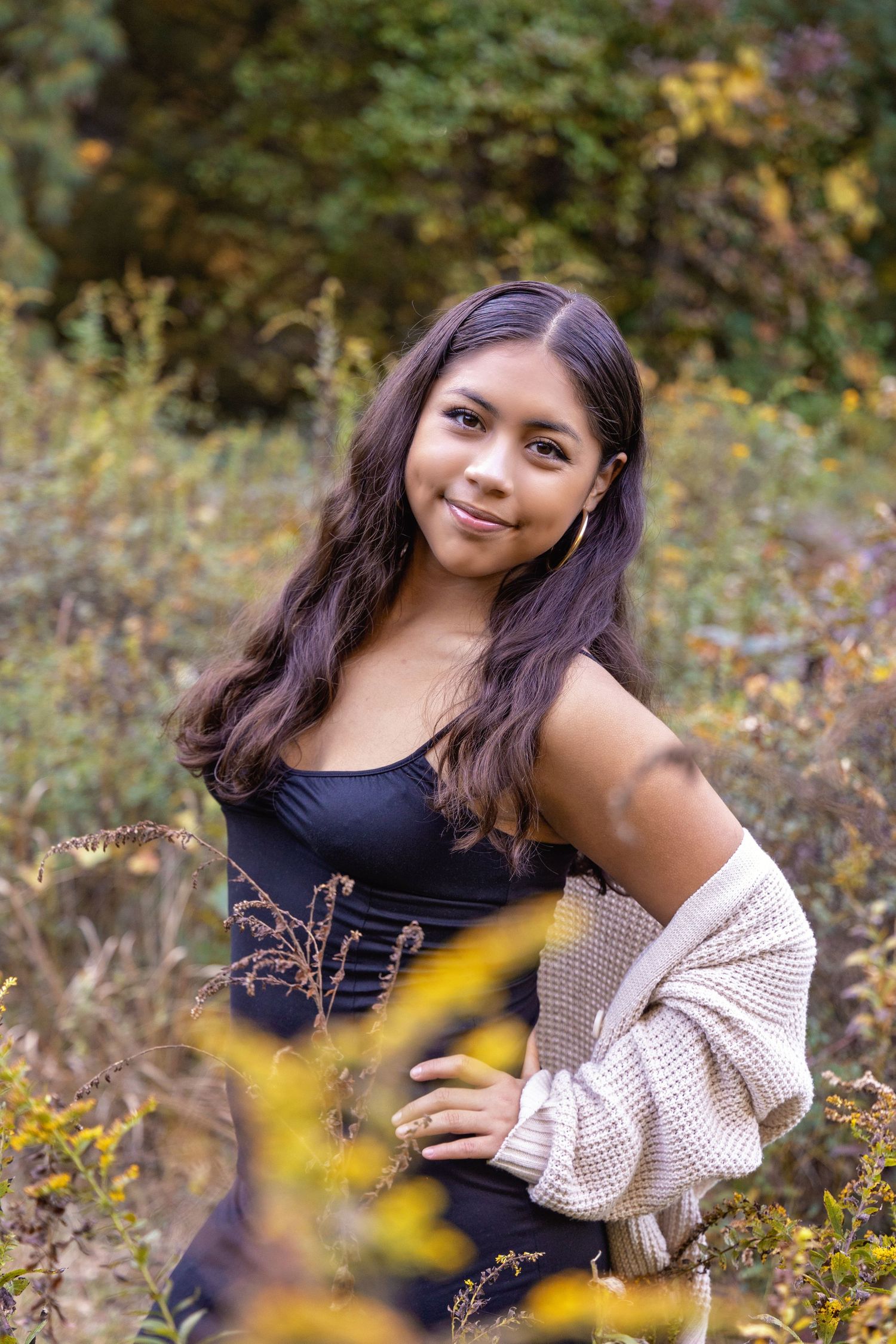 A series of outdoor portrait photos taken in a field of yellow wildflowers during golden hour.