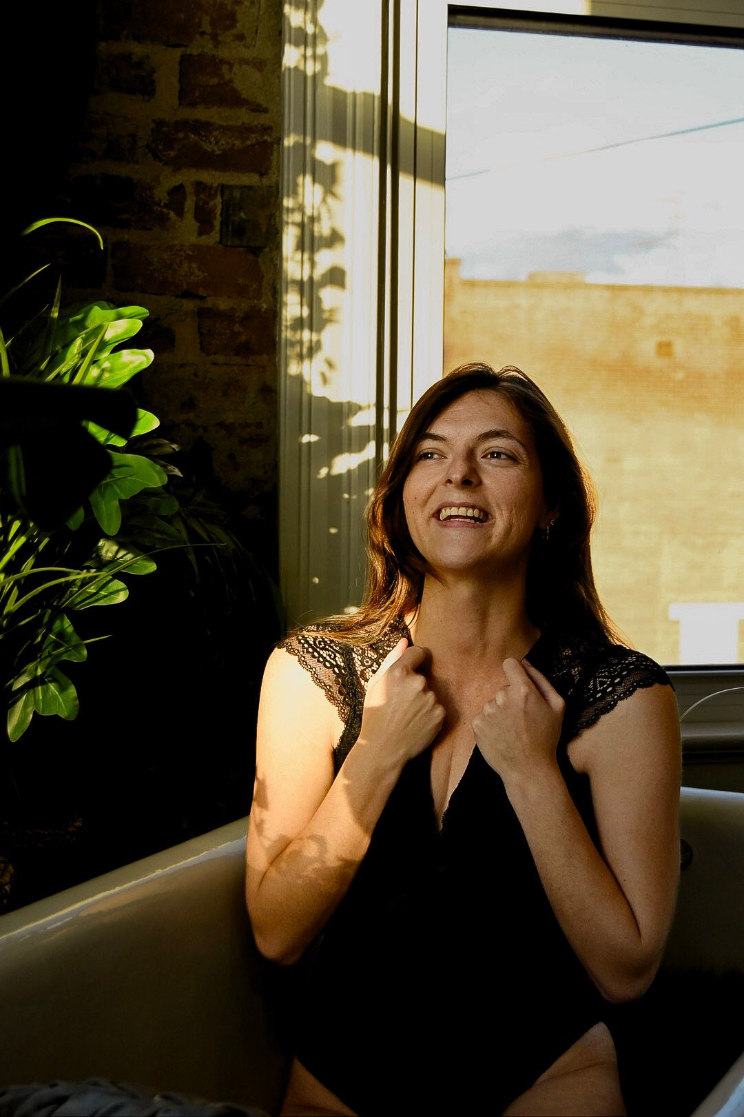A series of candid shots showing joyful laughter and natural expressions by a window with green plants.