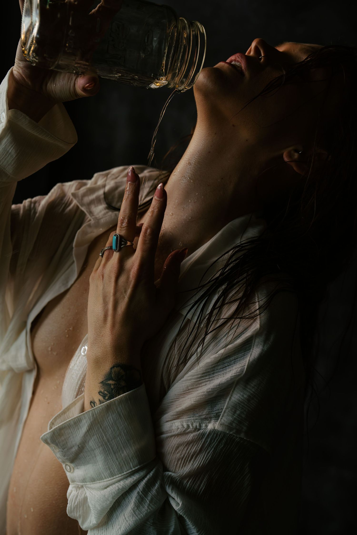 Artistic portrait series with dramatic side lighting and expressive poses.