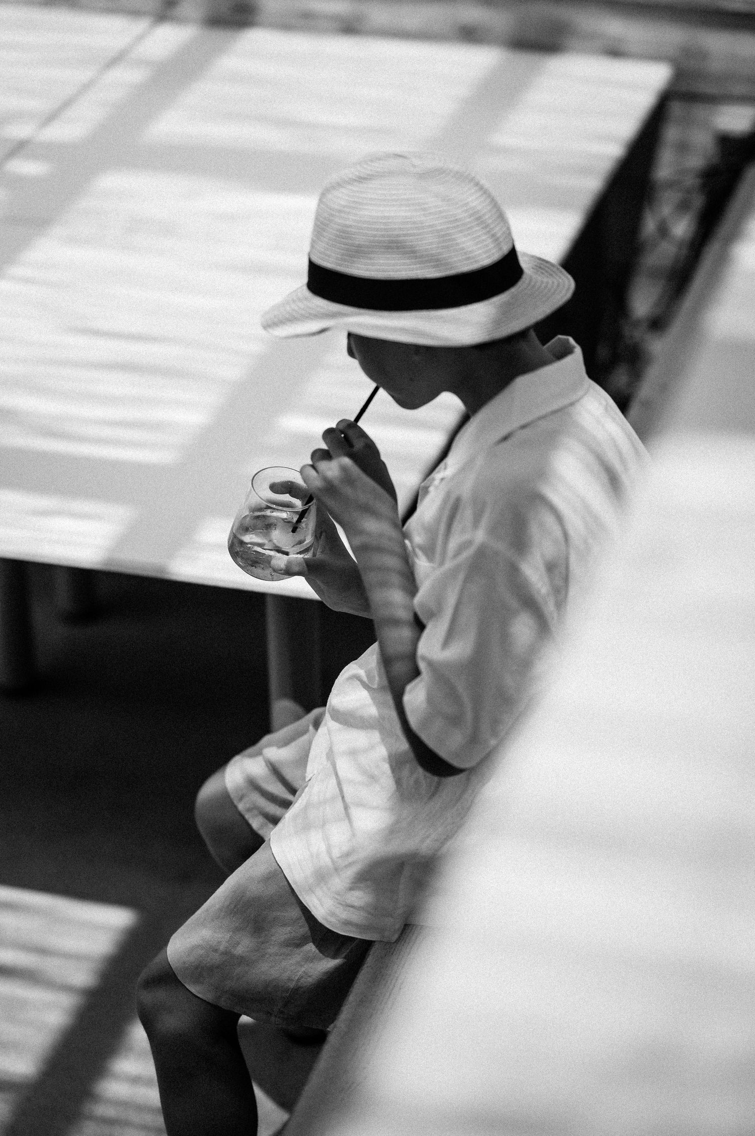 Artistic black and white series of candid moments at a formal event.