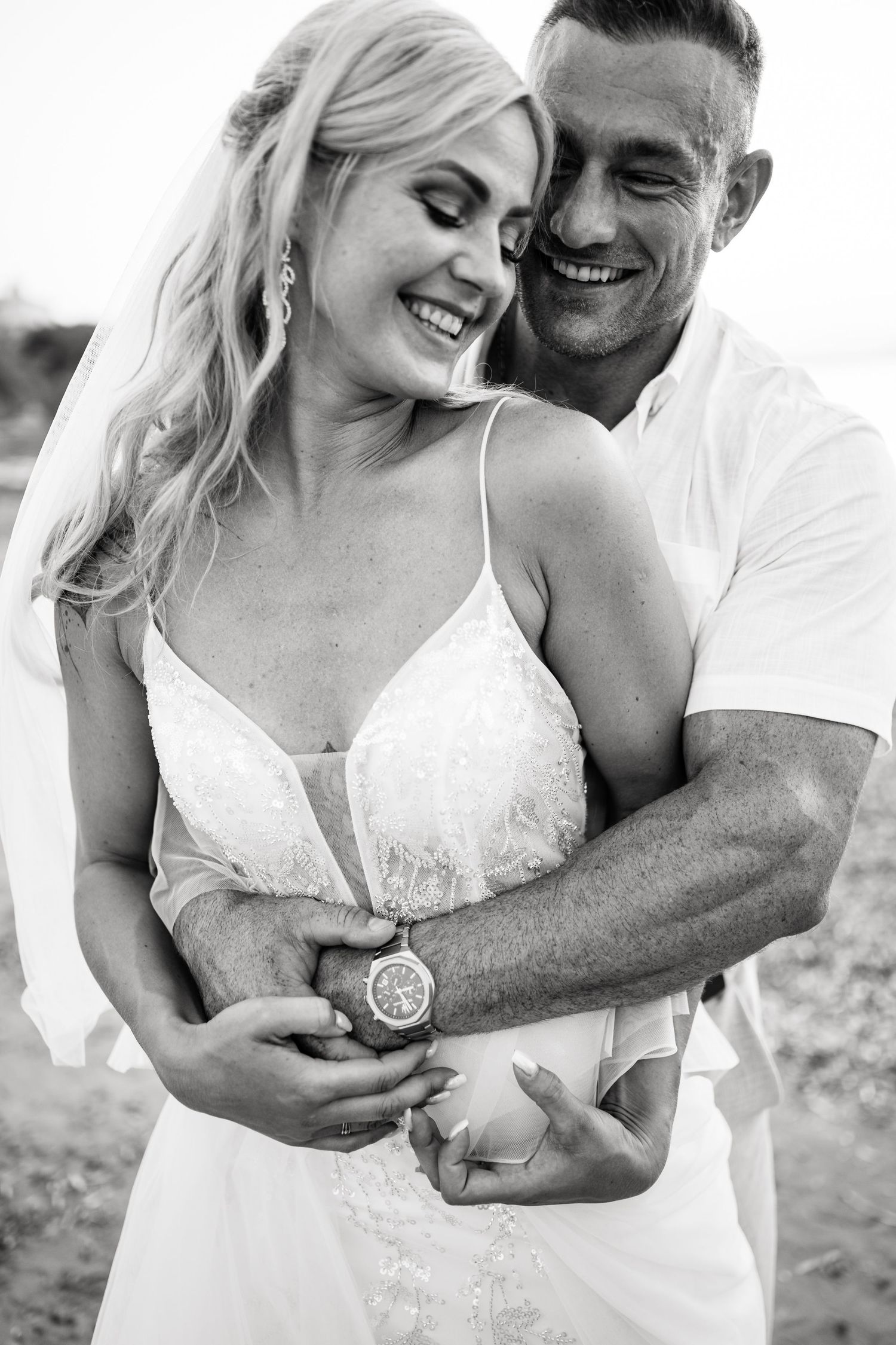 Black and white close-up shots capturing intimate moments between a couple.