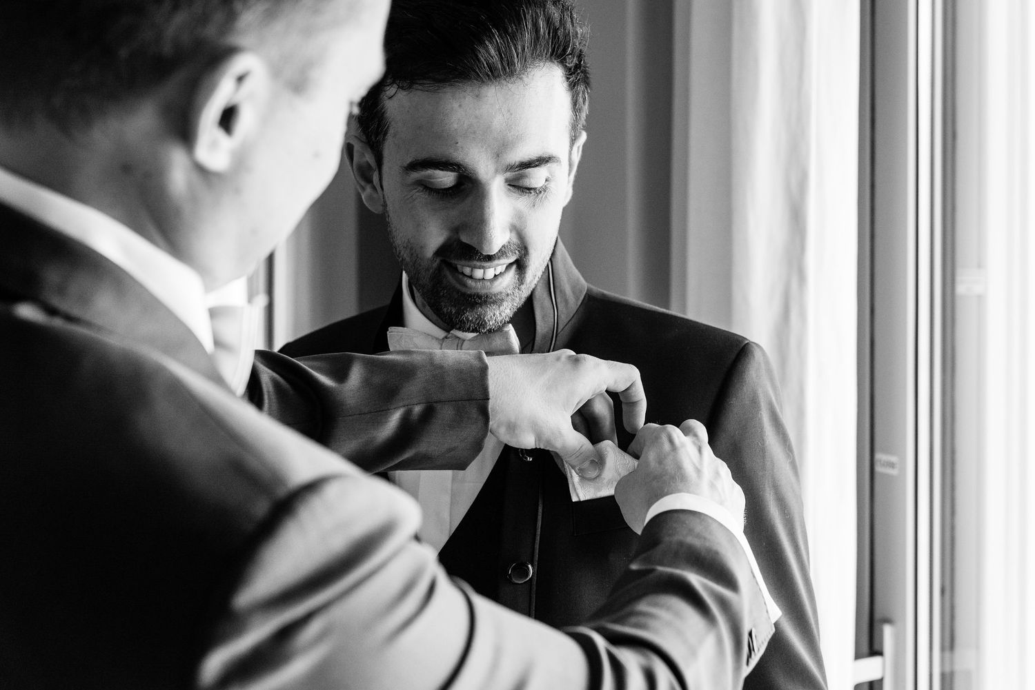 Sequence of black and white photos showing wedding day preparation moments.