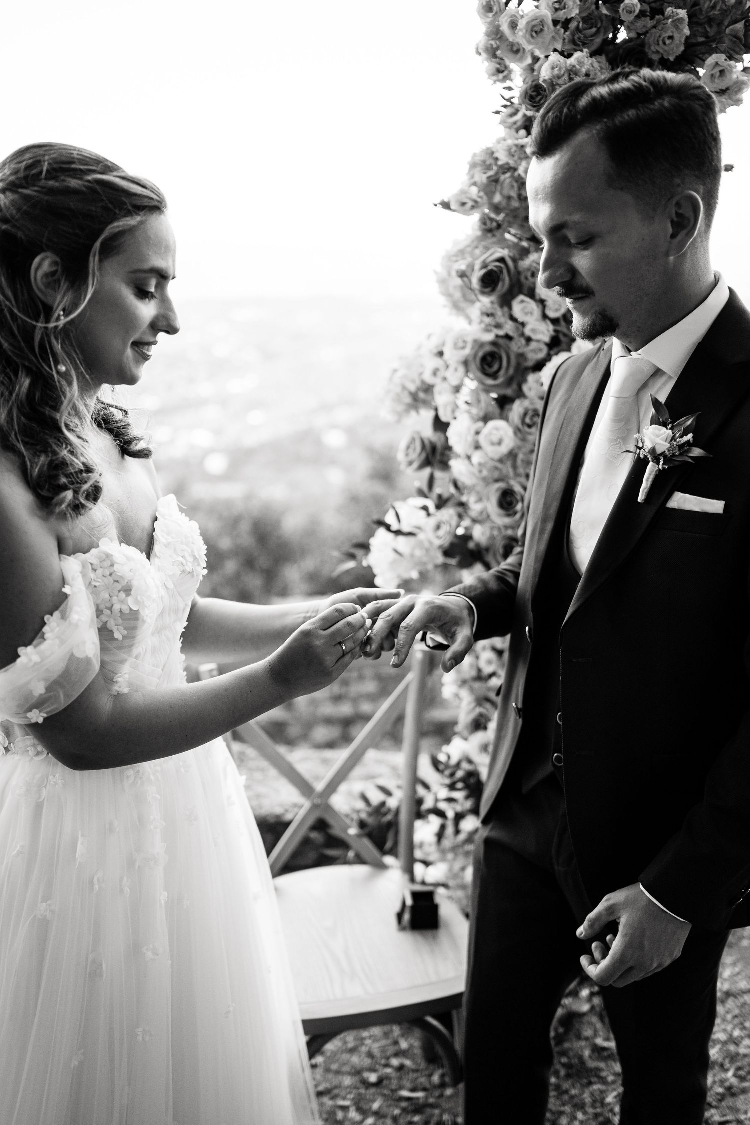 Artistic black and white wedding photography sequence showing tender moments.