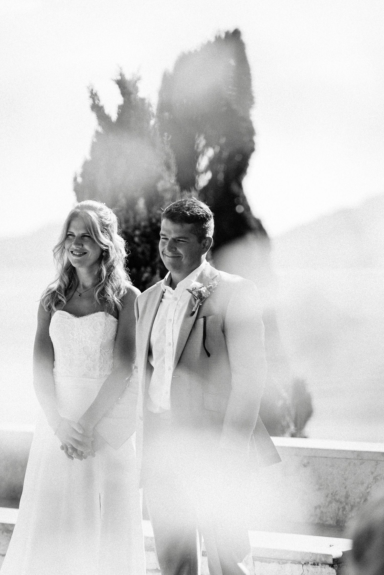 Dreamy black and white wedding portraits with soft natural light effects.