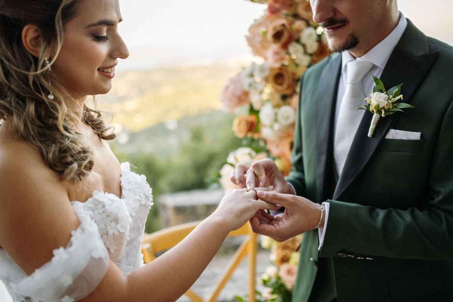 Intimate wedding moments captured during an outdoor ceremony.