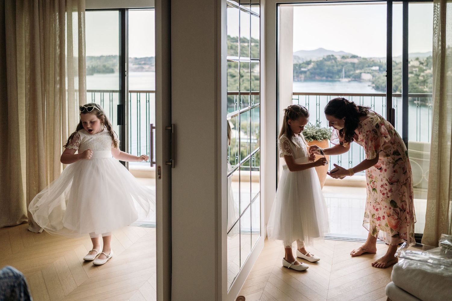 Wedding preparation sequence showing dress and people by large windows with water view.
