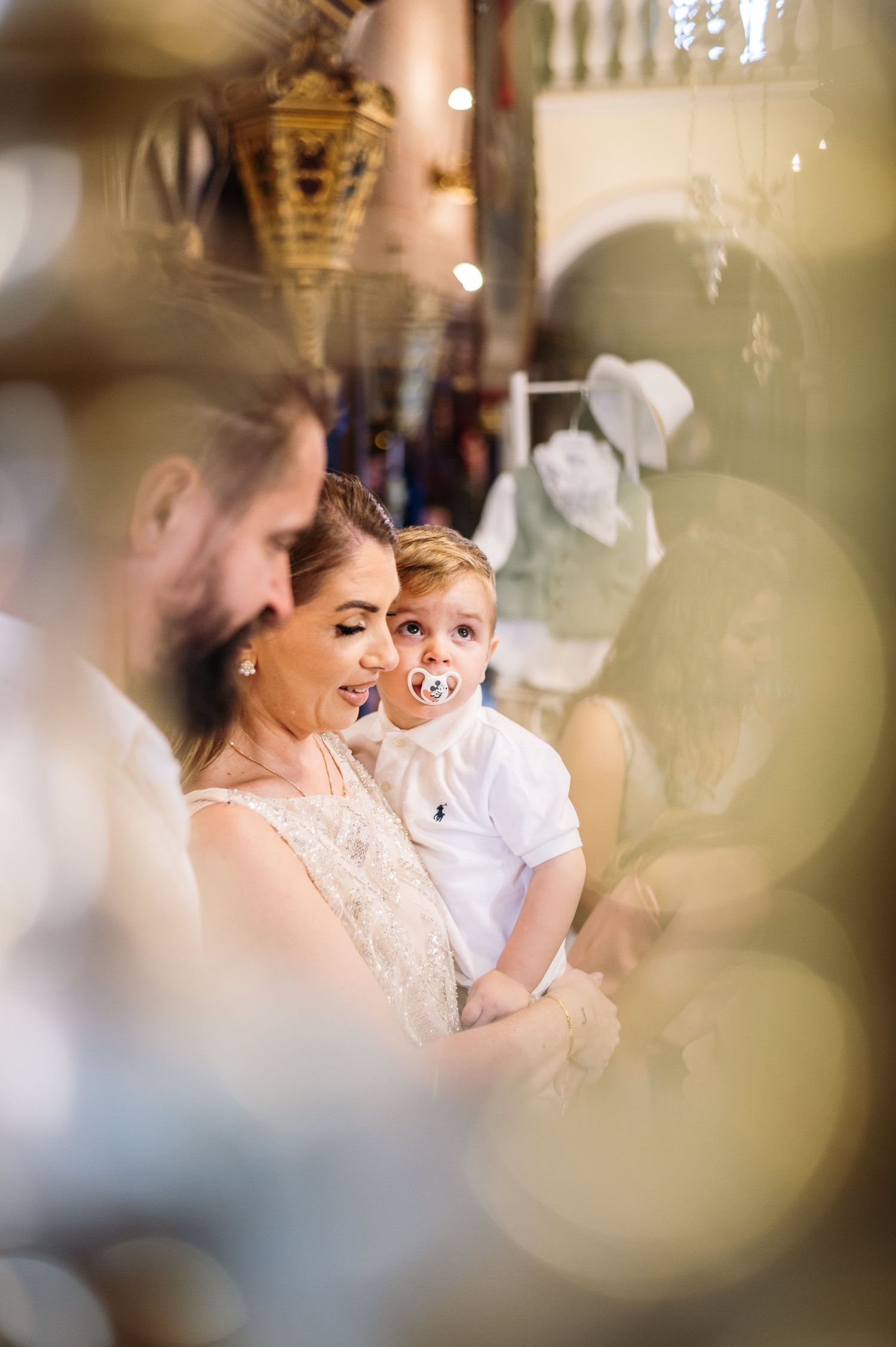 Soft focus celebration moment with bokeh light effects.