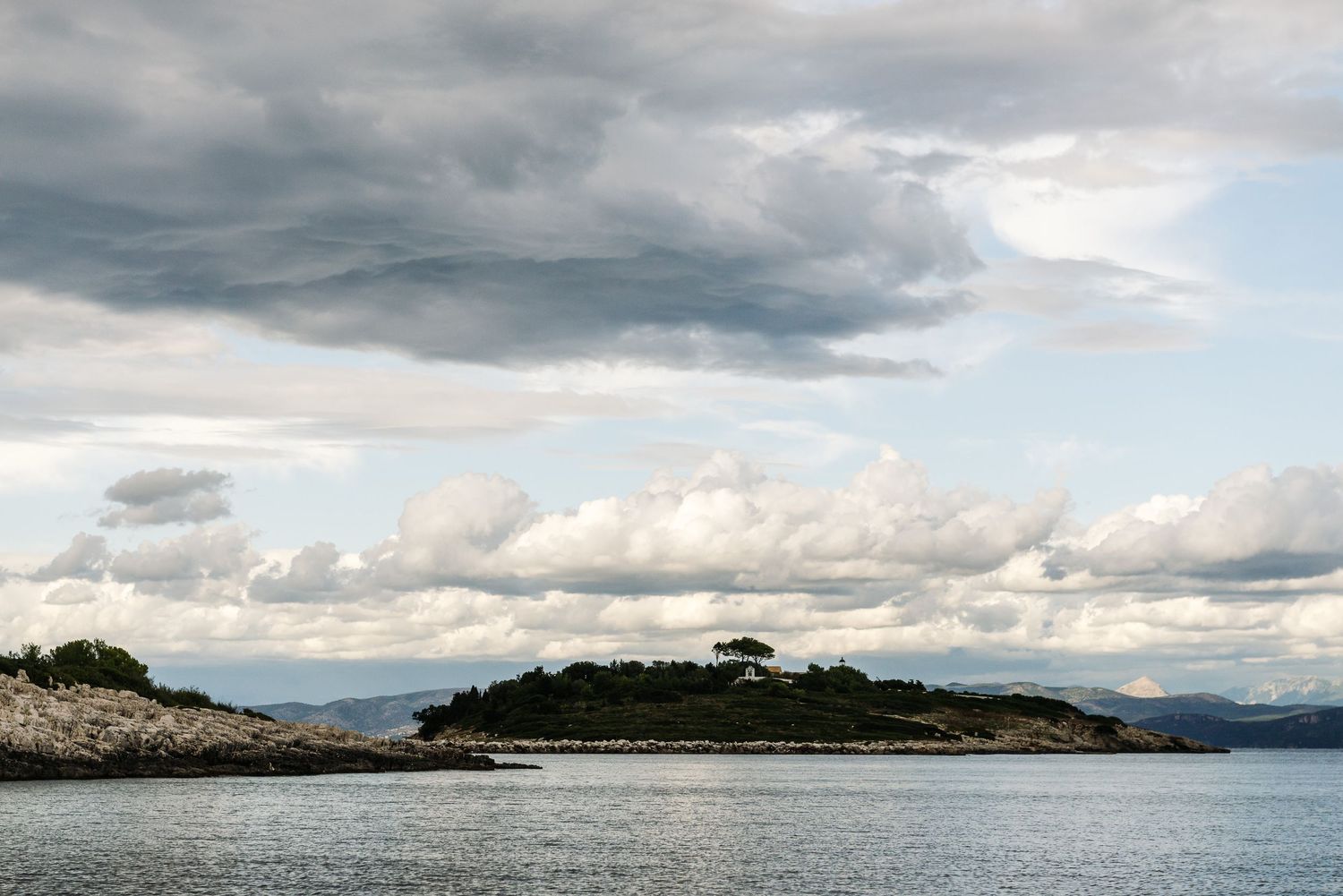 Dramatic cloudy seascape with coastal views.