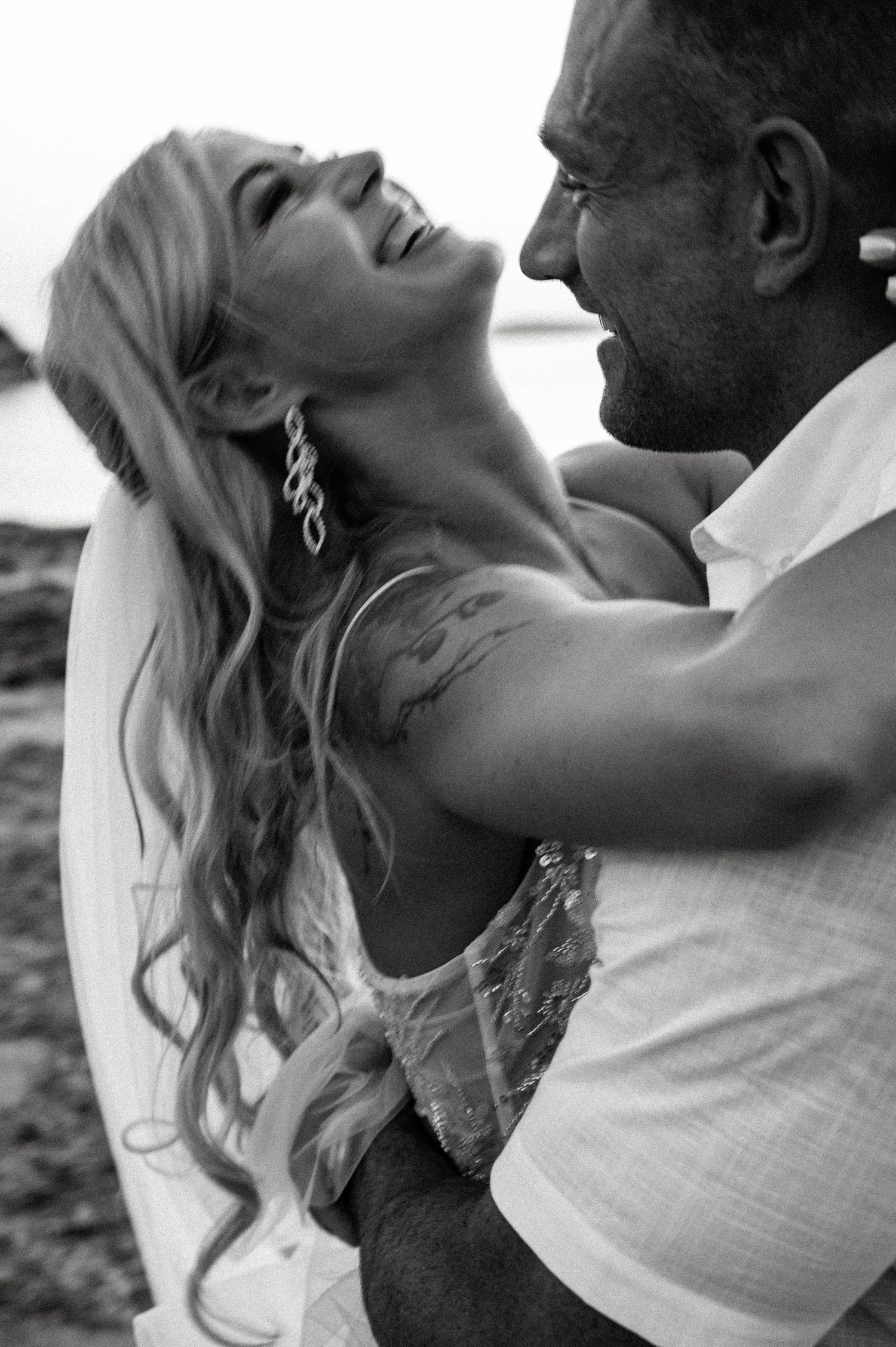 Romantic black and white portraits showing tender moments between a couple.