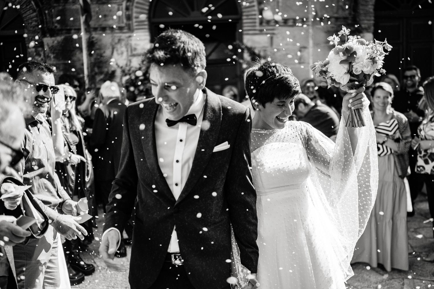 Wedding celebration sequence showing joyful moments with confetti and formal attire.