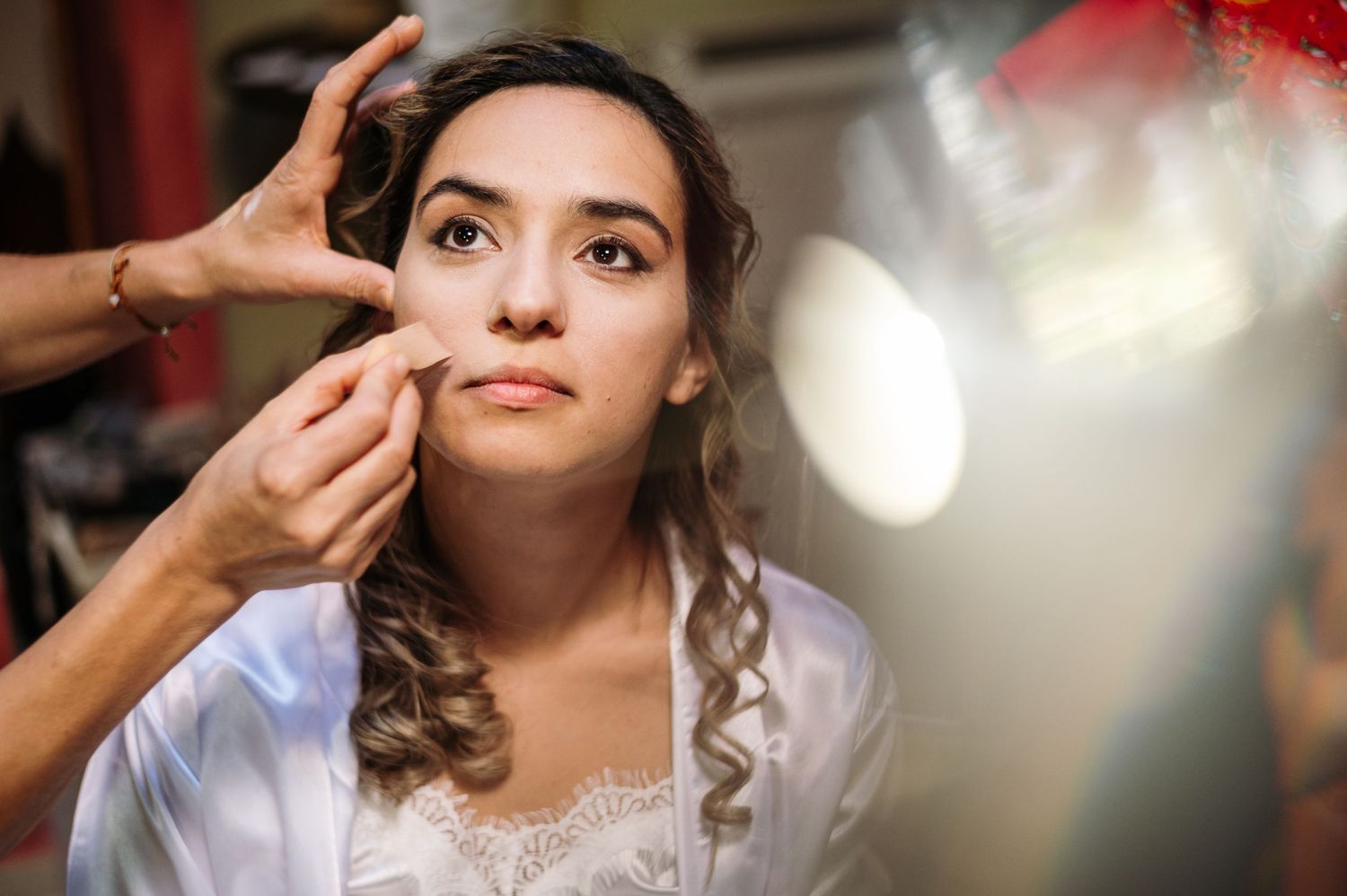 Close-up artistic shots showing preparation moments in soft lighting.