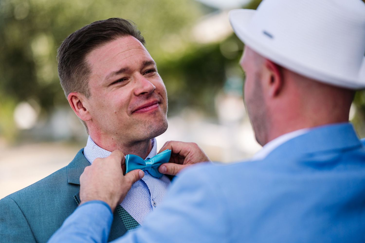 Emotional wedding moment captured in a sequence of candid shots showing joy and laughter.