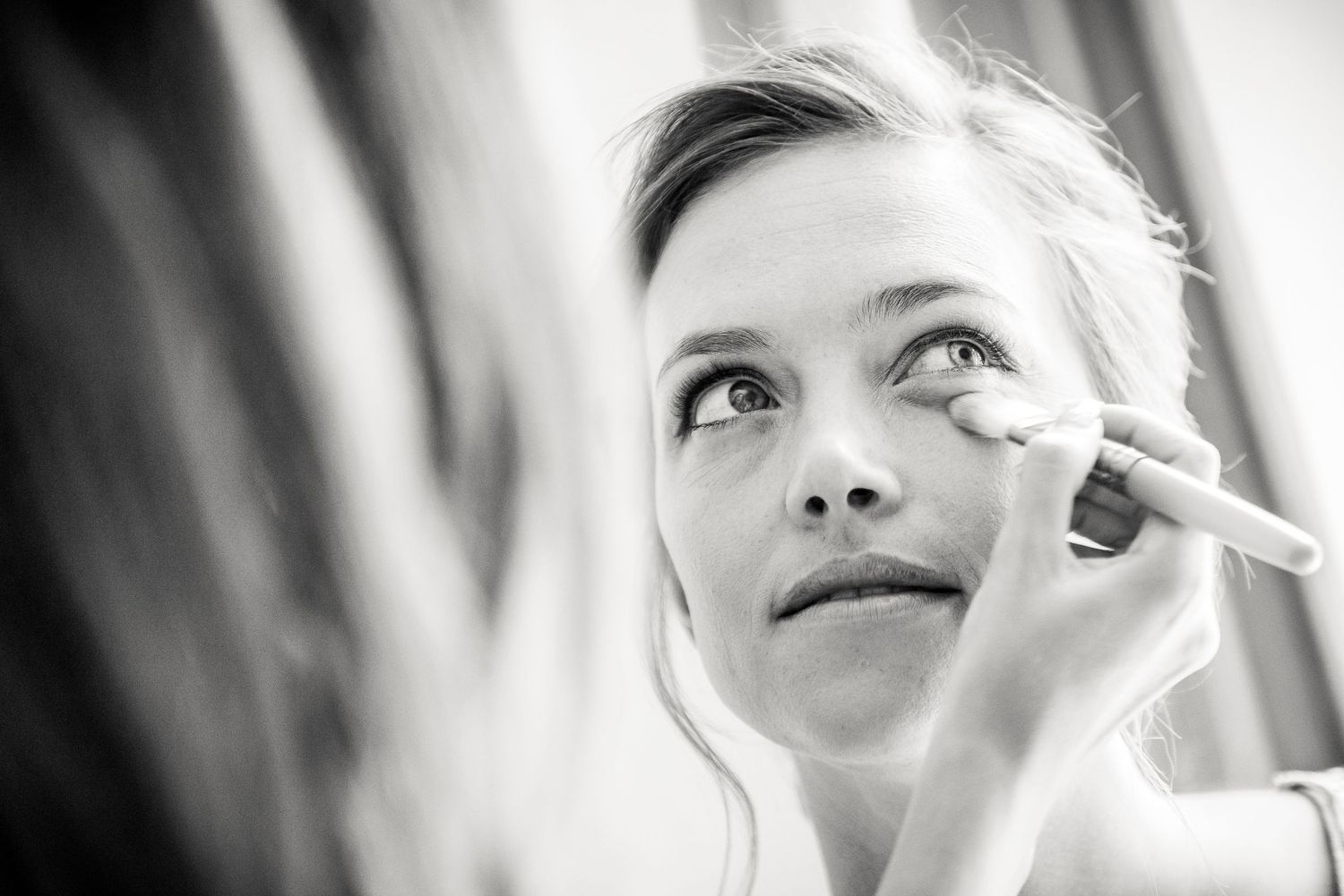 Dramatic black and white portrait series showing emotional expressions and side profiles.
