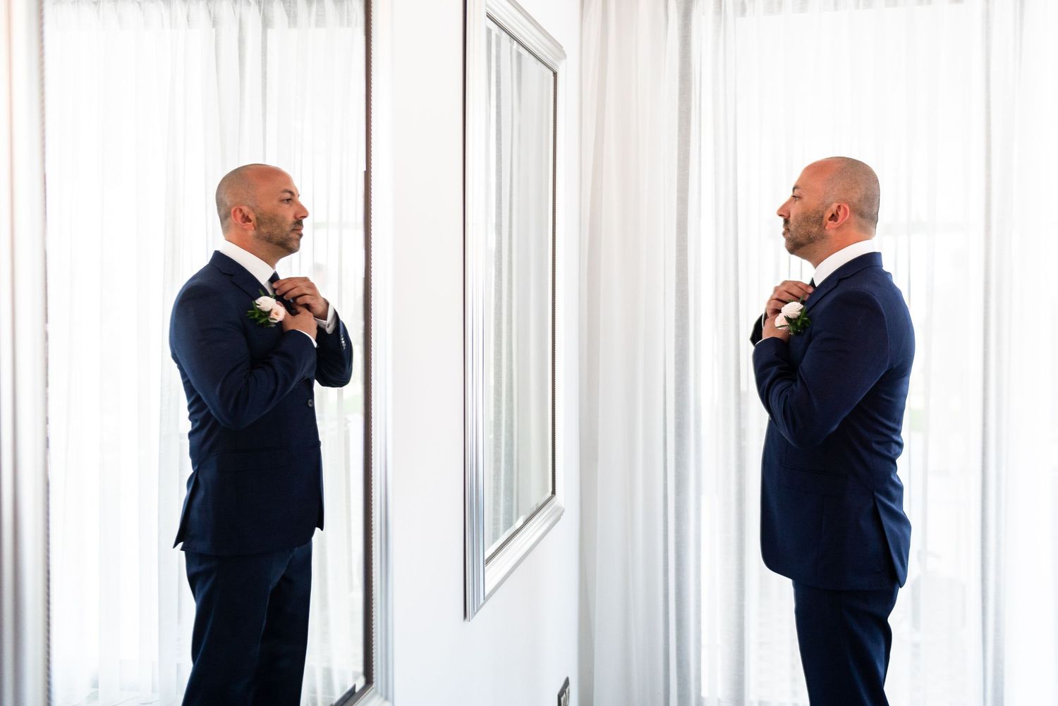 A sequence of silhouettes against white curtains showing formal attire and elegant poses.