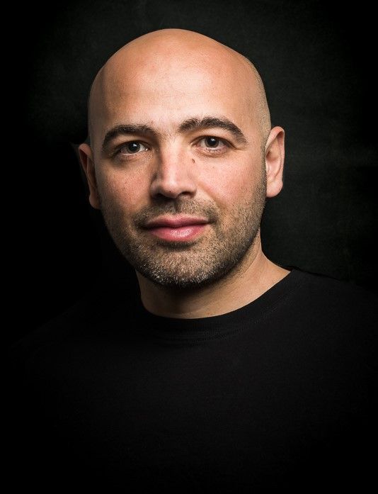 Dramatic portrait series against black background showing different angles of expression.