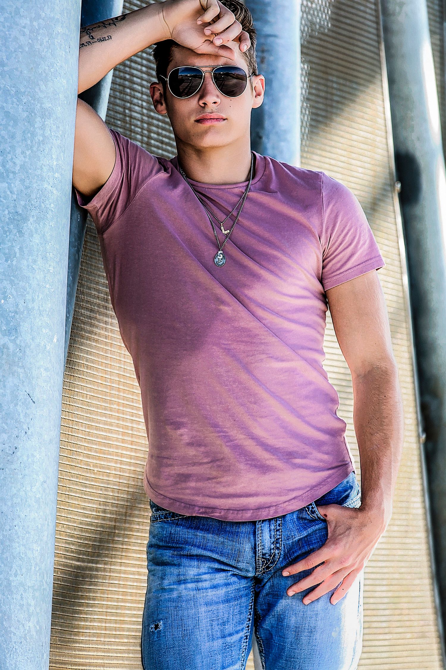 Max brought the model vibes with his purple t-shirt and jeans, he is a natural.