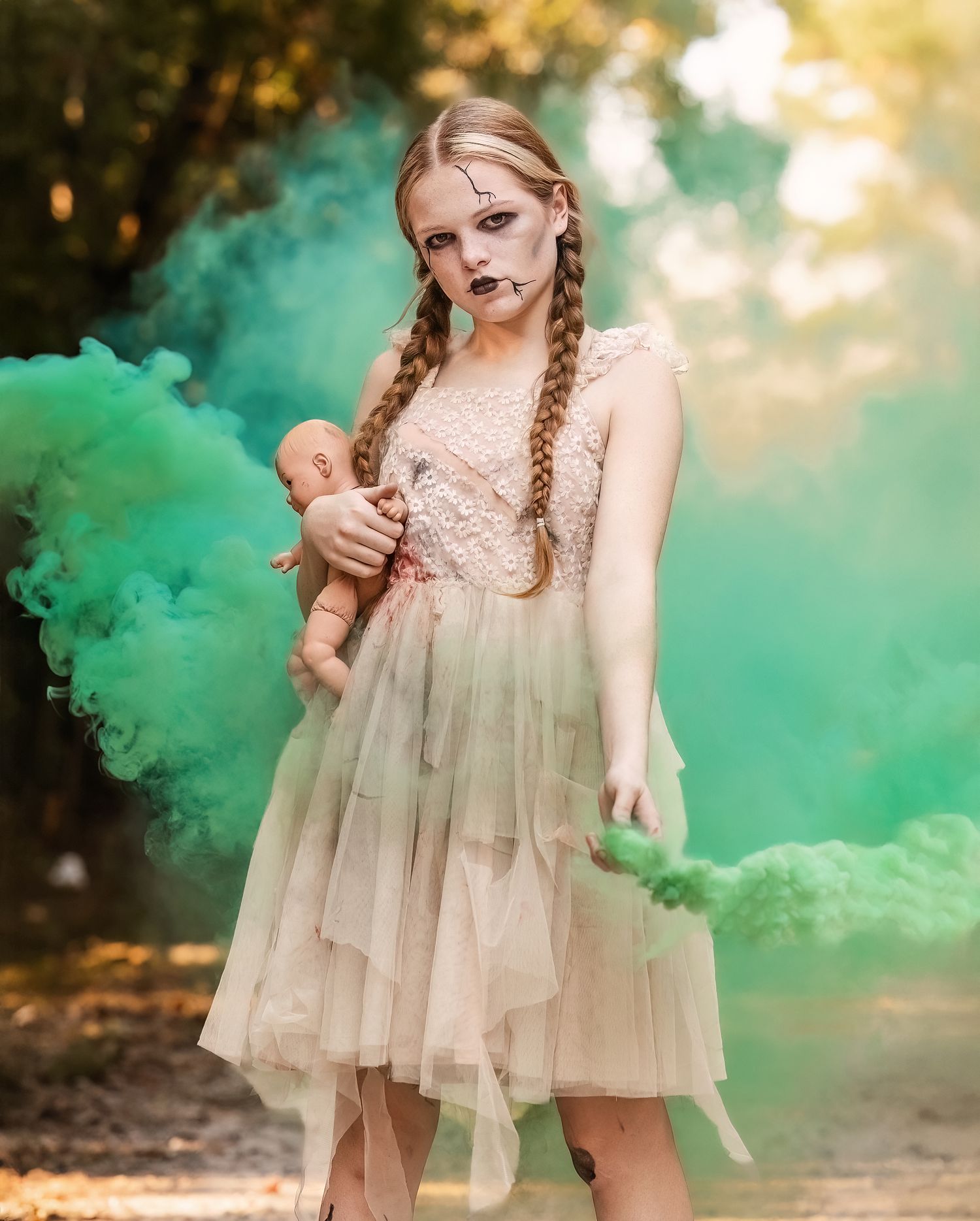 Spooky halloween portrait with green smoke and vintage dress.