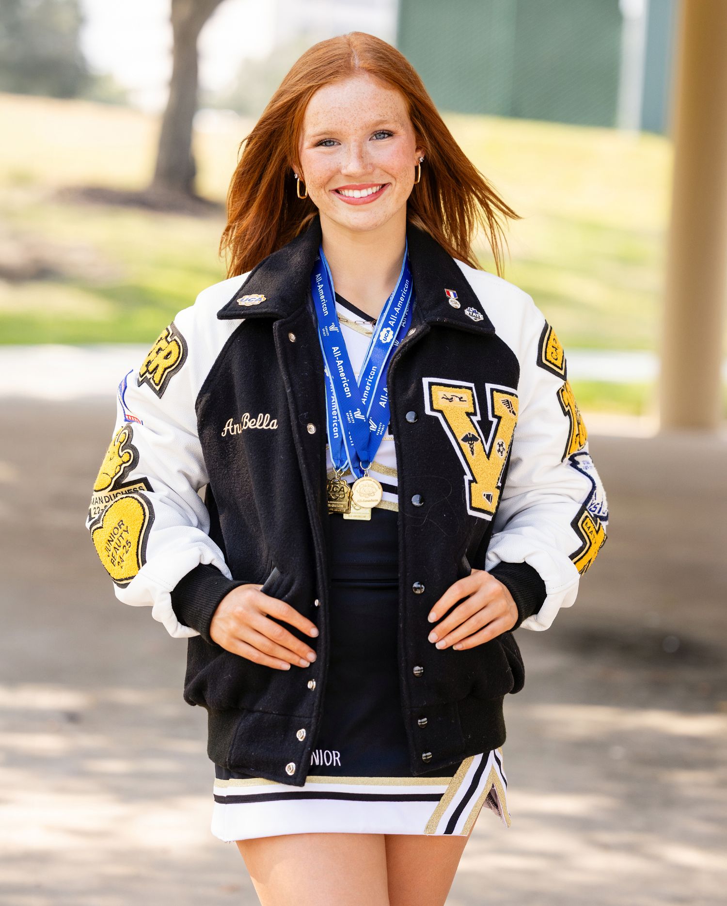 I love Annabella wore her  varsity letterman jacket and medal for her Sports and Spirit photo session.