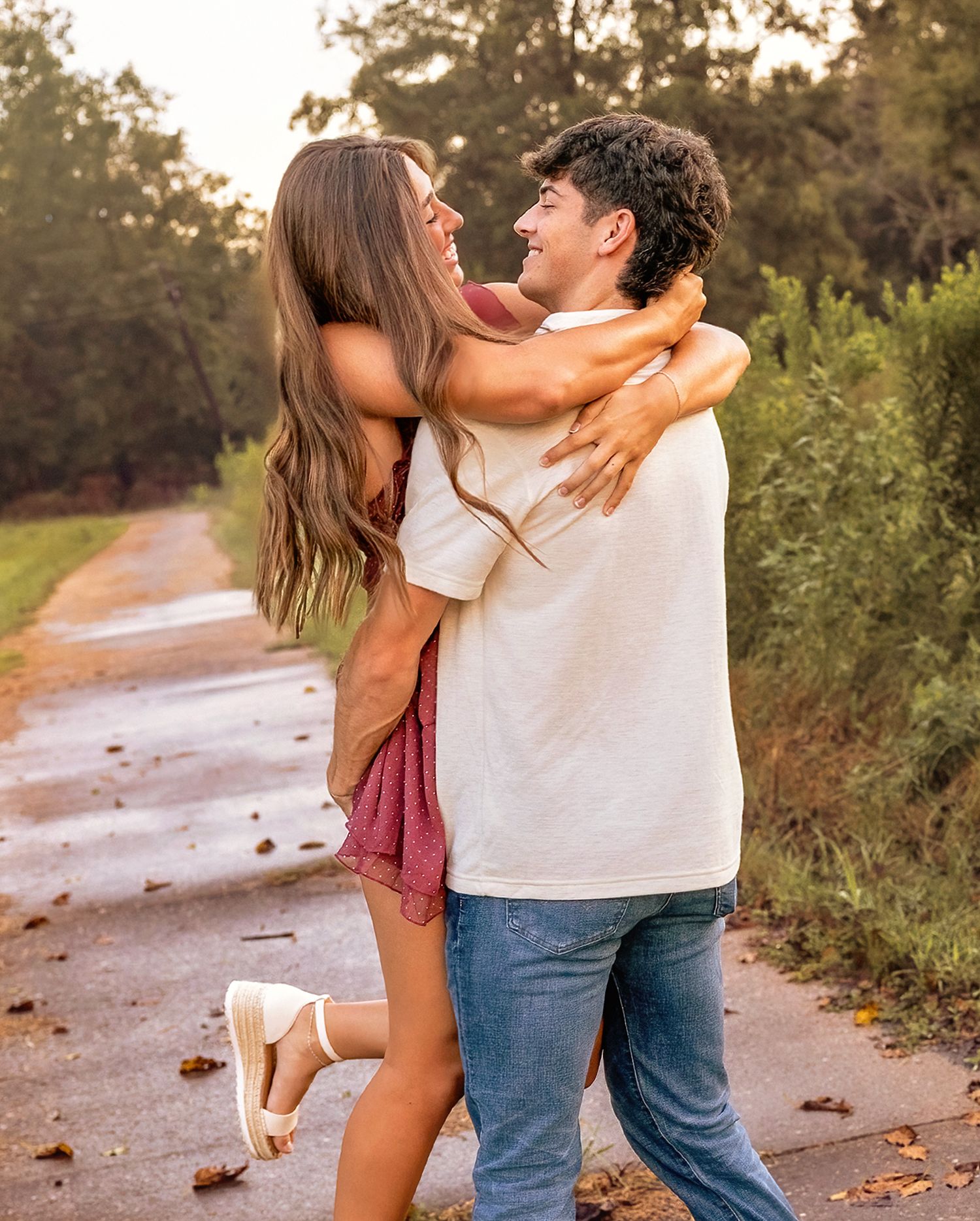 Couples photoshoots touch your heart.  The  sunlit path surrounded by greenery during golden hour with all the love.