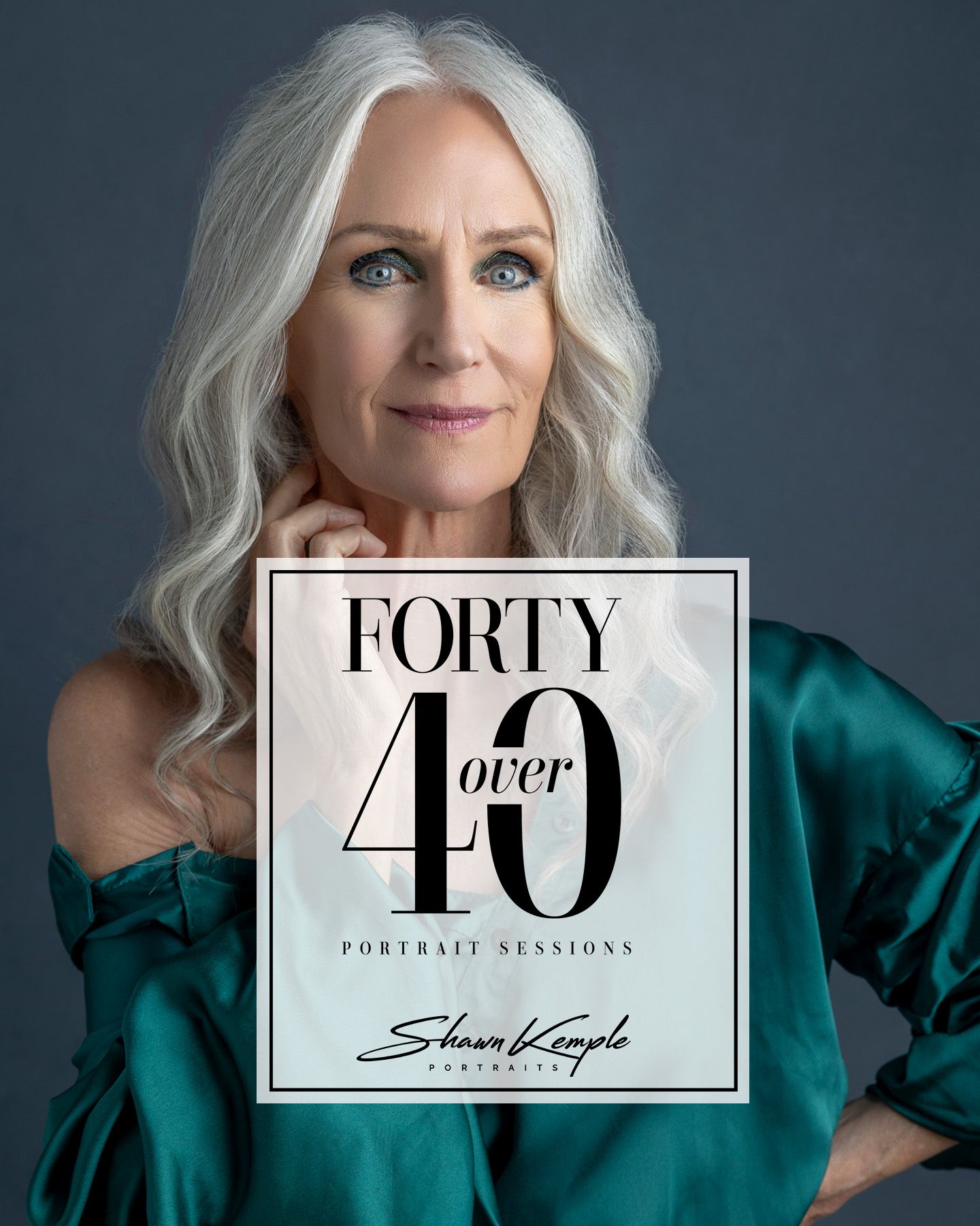 Marketing photo for Forty Over 40 portrait sessions showing woman in emerald silk top against grey backdrop.