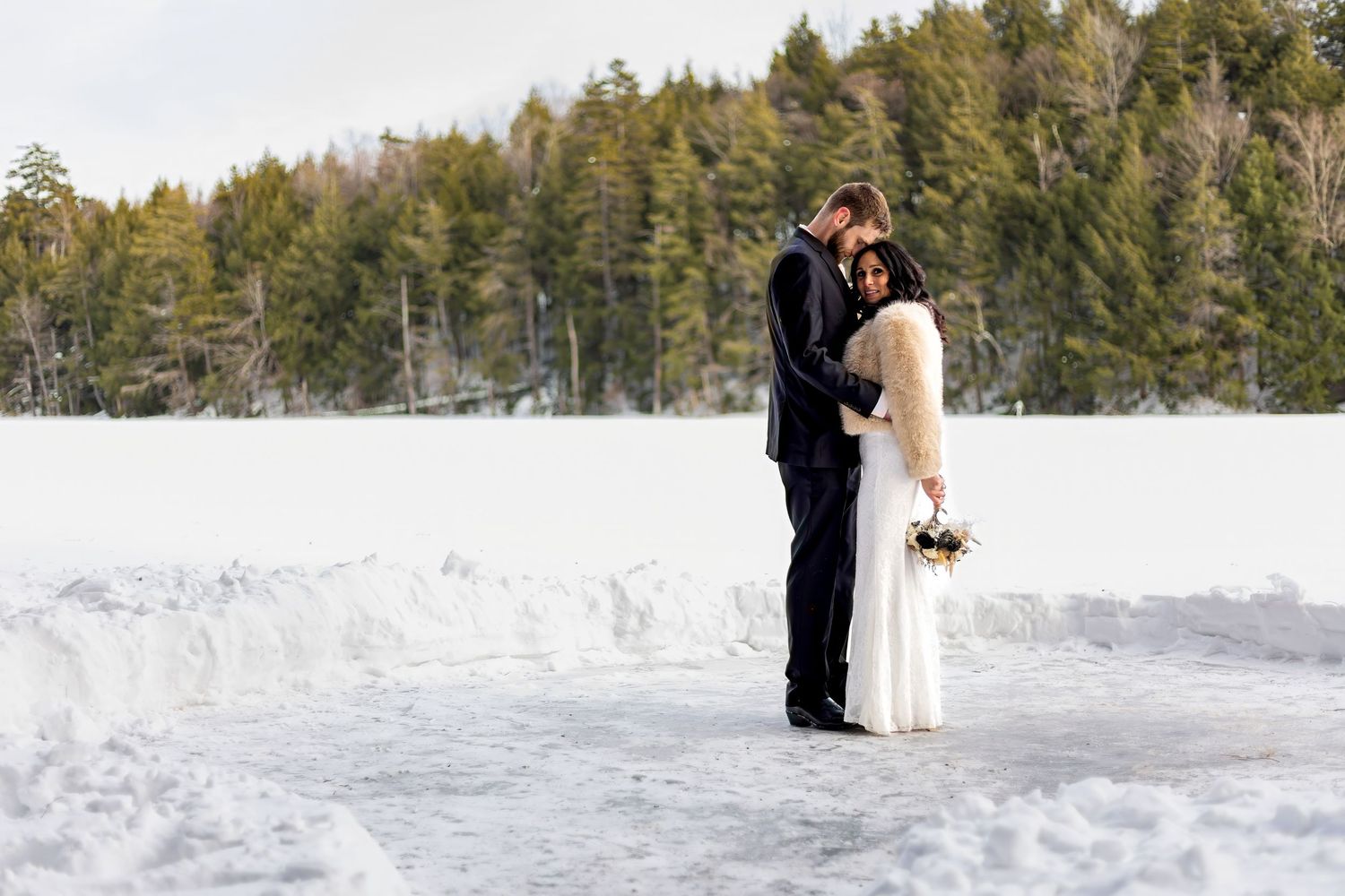 Panoramic winter wedding photos with snow-covered forest backdrop.