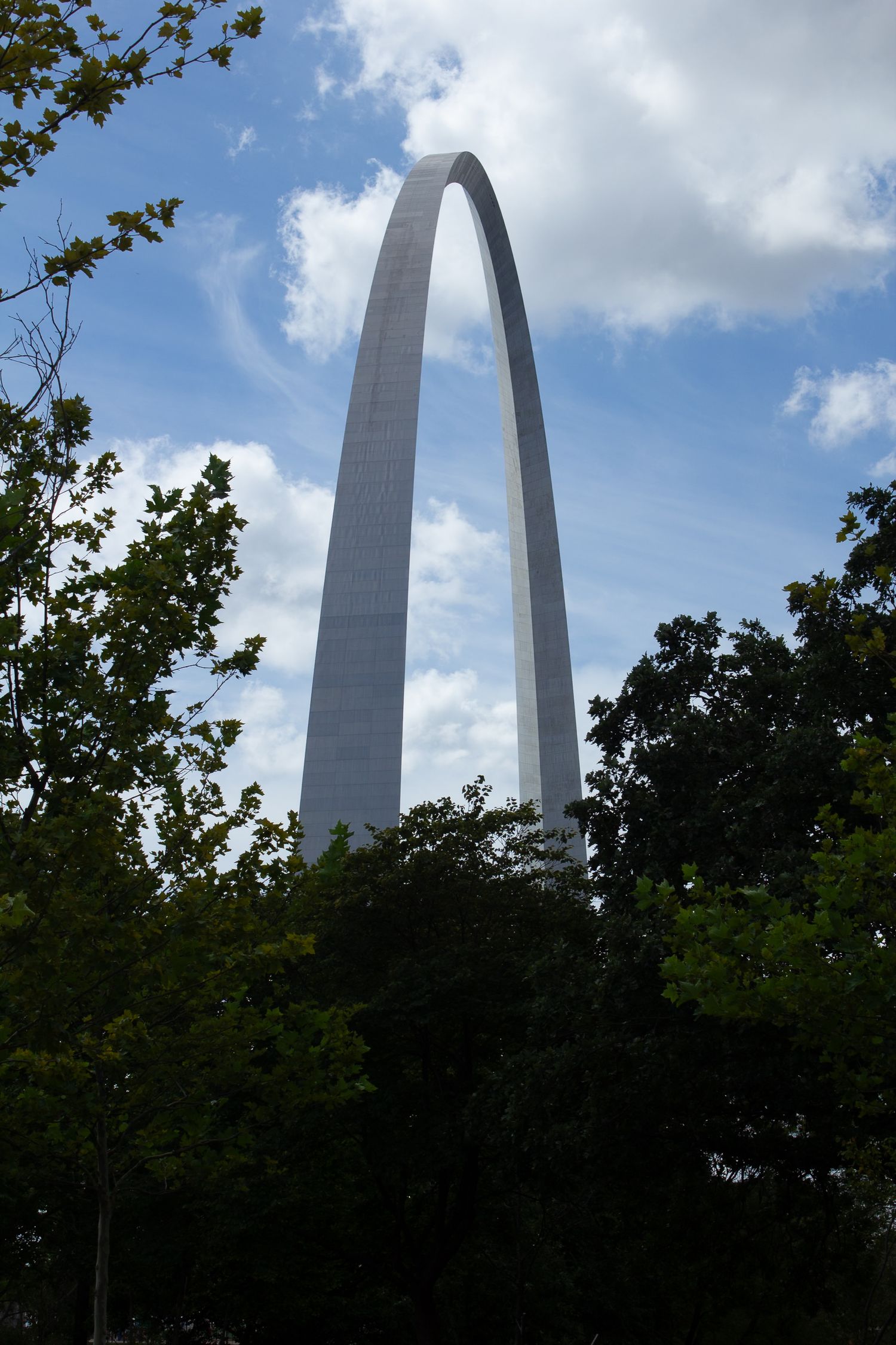 St Louis Gateway Arch behind wooded area