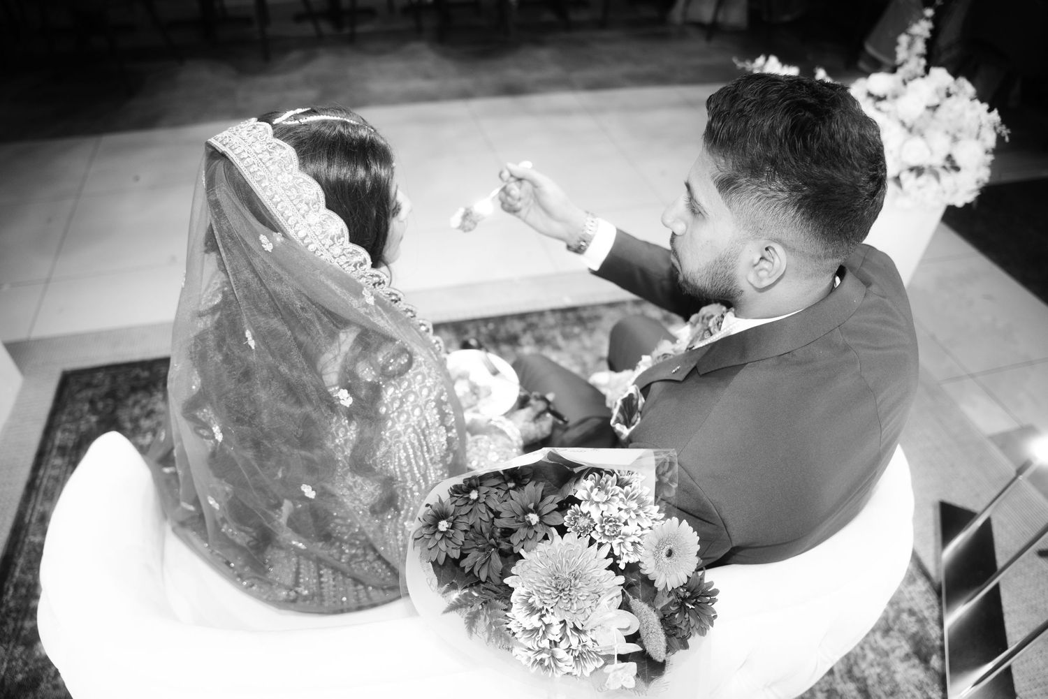 A black and white sequence of a romantic dance moment.