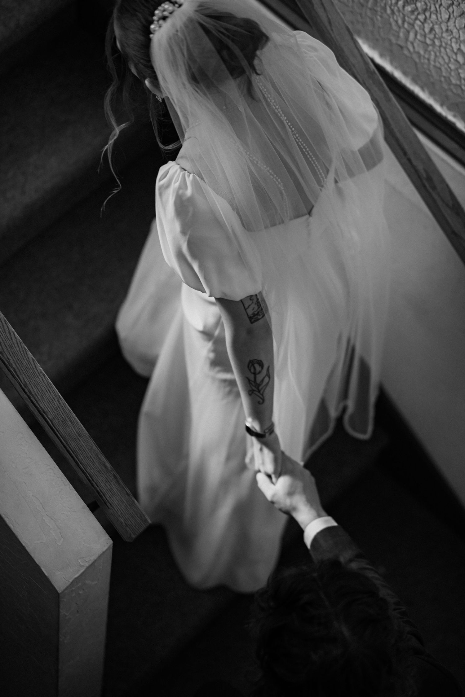 A series of black and white photos capturing an ethereal figure in a flowing white bridal veil and dress creating a ghostly mood.