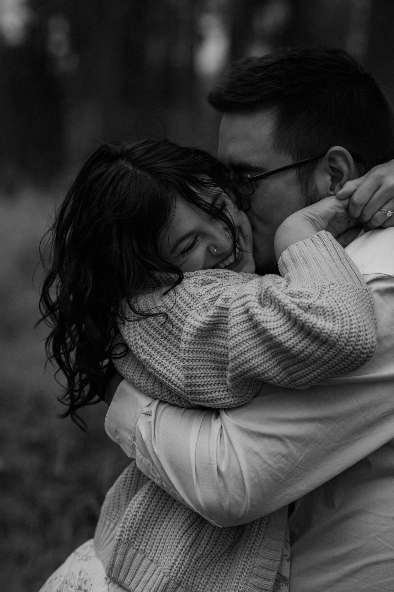A black and white photo sequence shows two people embracing in an emotional moment.