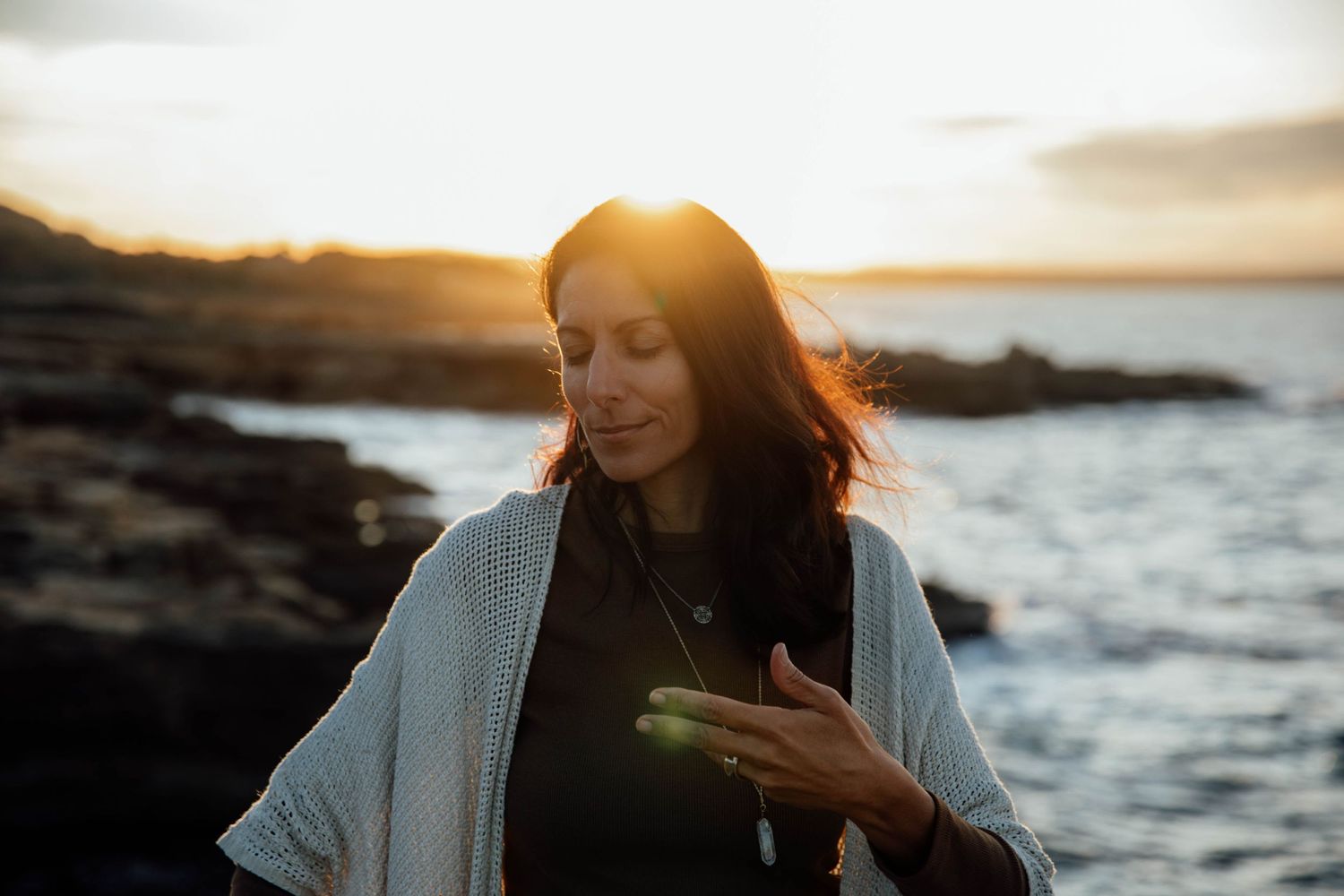 Portrait of a person surrounded by natural light in Mallorca, showcasing their inner light and authentic energy. A spiritual photography se