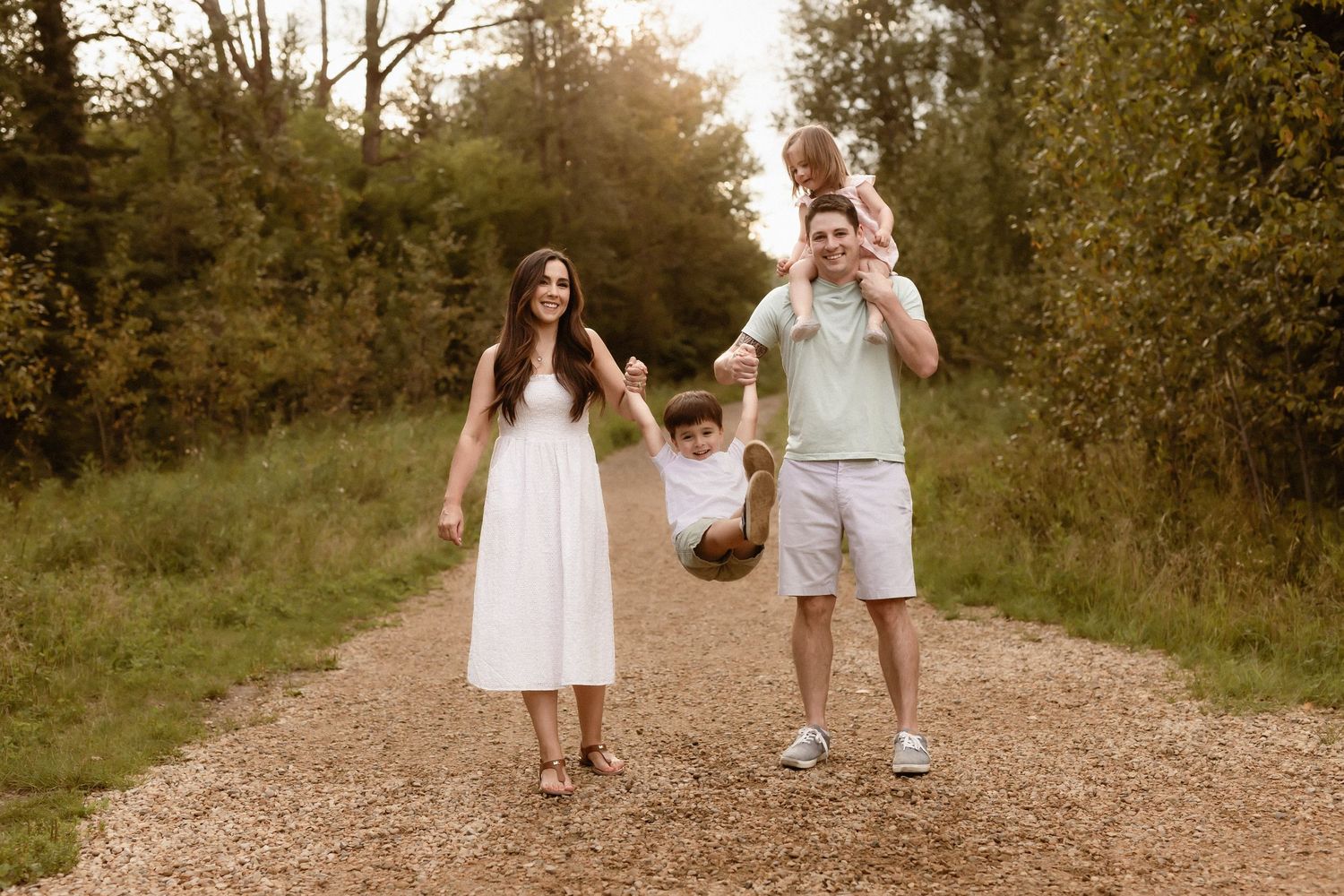 What to wear family photography.  family of four in pastel.  Family in the park