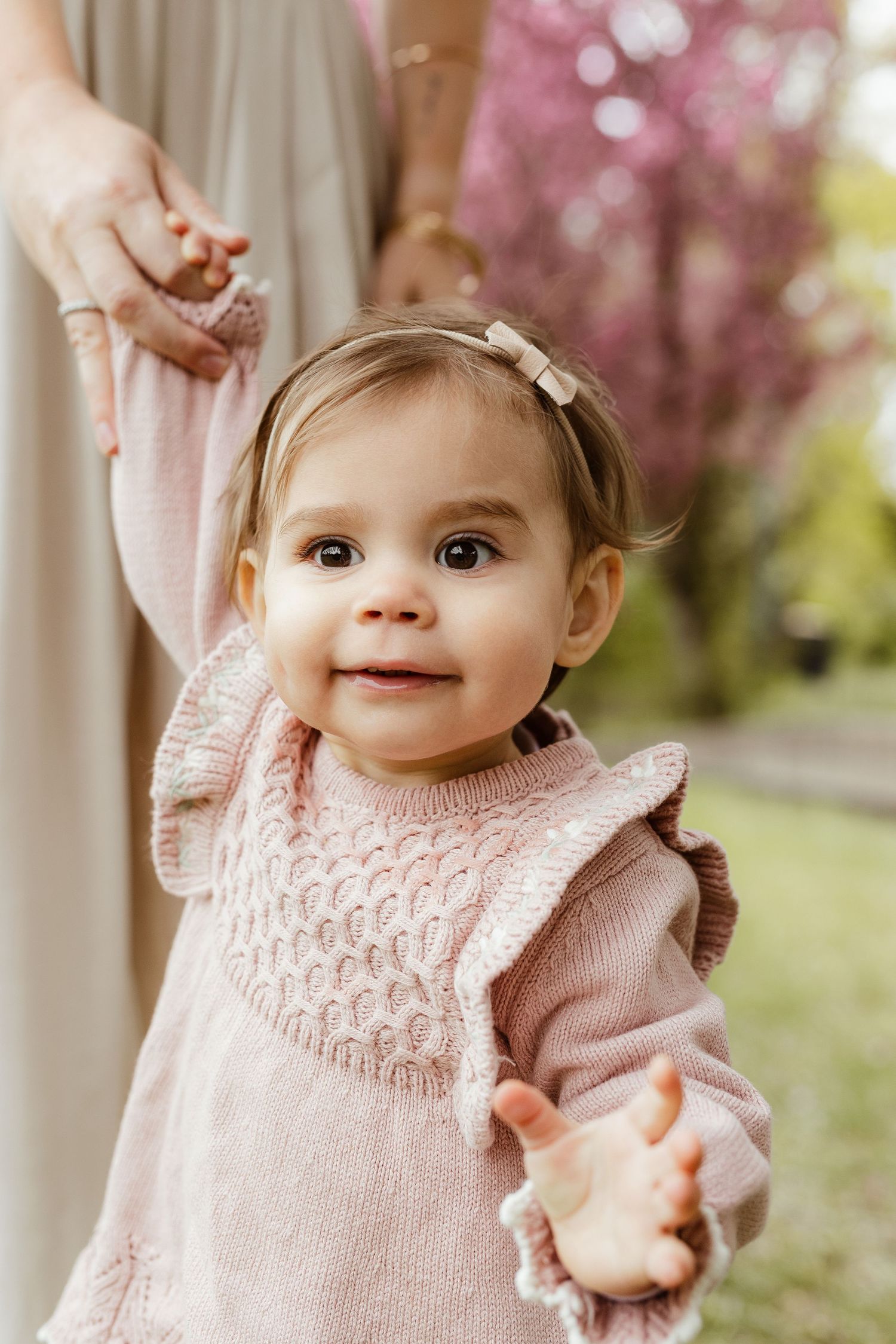 family photos in Edmonton during spring blossoms soft pastel outfits