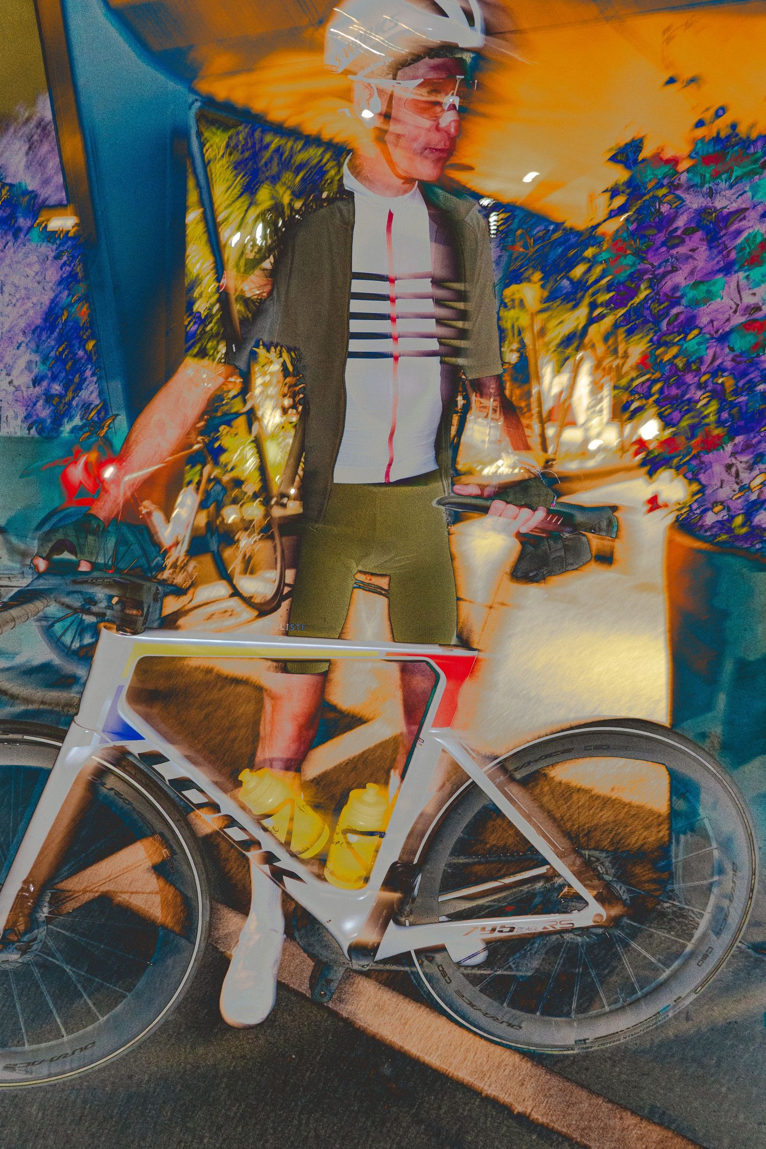 Multiple sequential shots of a cyclist in motion against a vibrant orange and blue graffiti wall background.