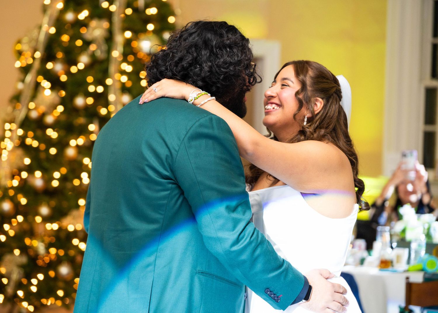Emotional first dance moments captured through candid movement, lighting, and genuine celebration.