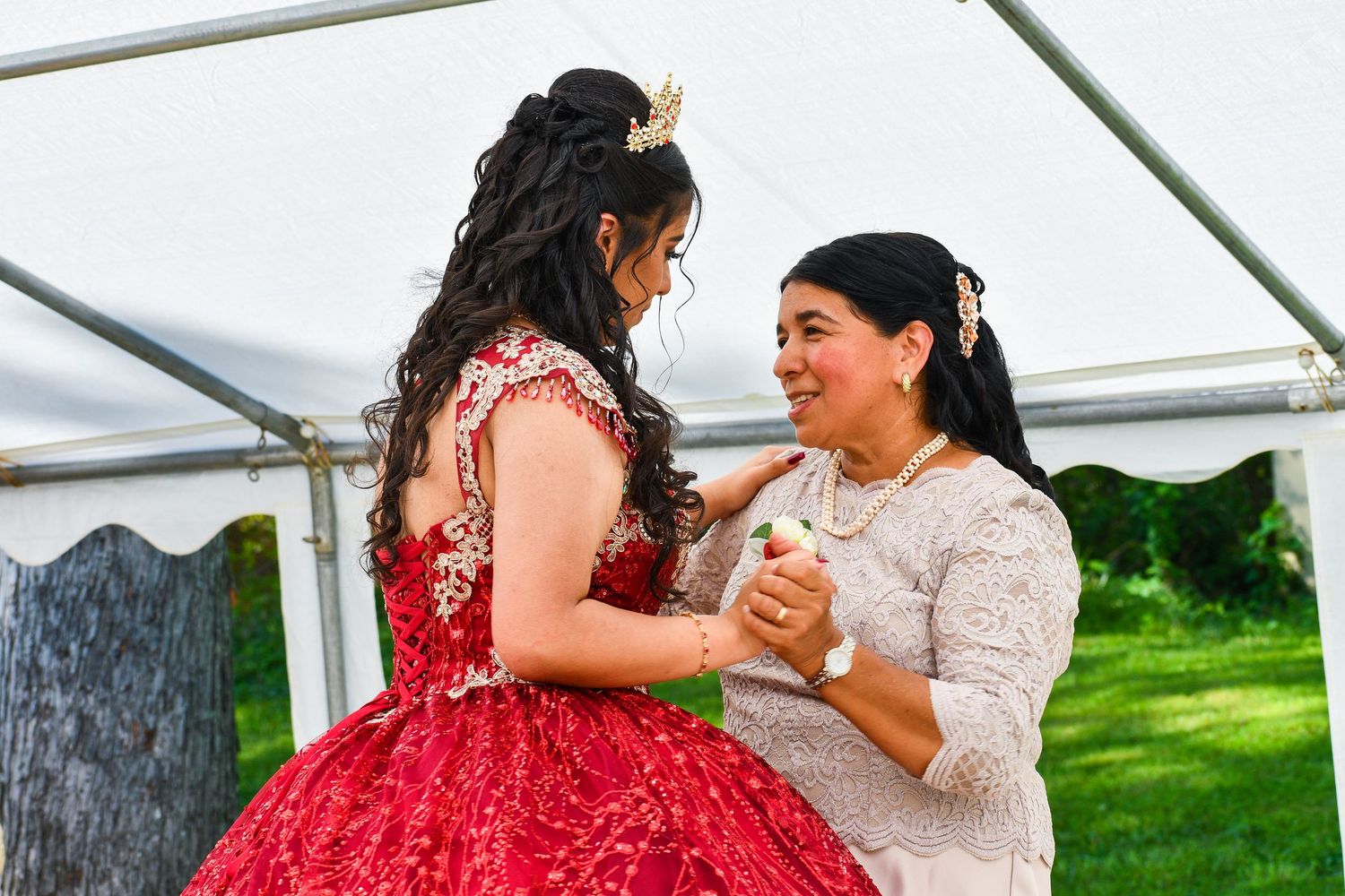 Heartfelt moment of the daughter dancing with her mother during the reception.