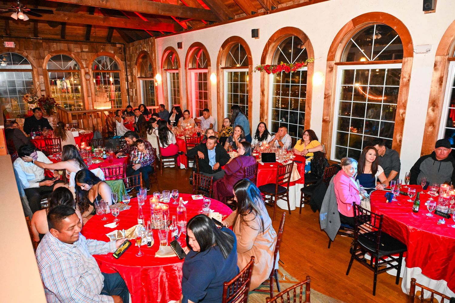 Candid reception moments filled with dancing, laughter, and celebration with family and friends.