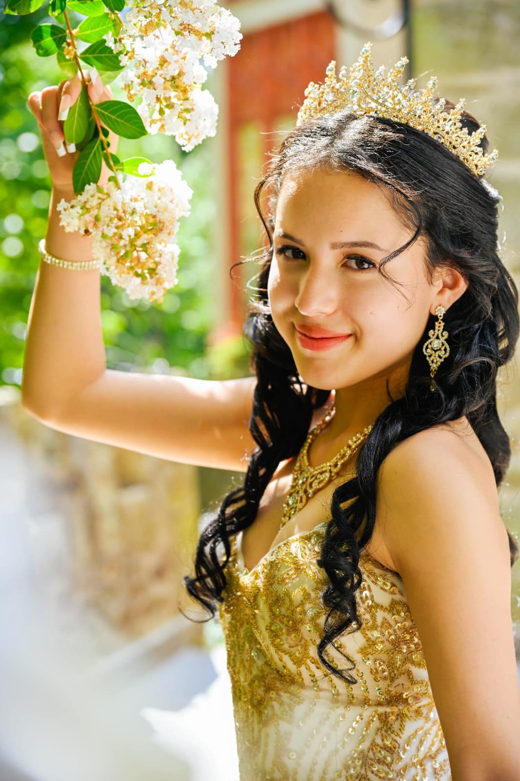 Elegant quinceañera portraits surrounded by flowers, beauty, and timeless details.
