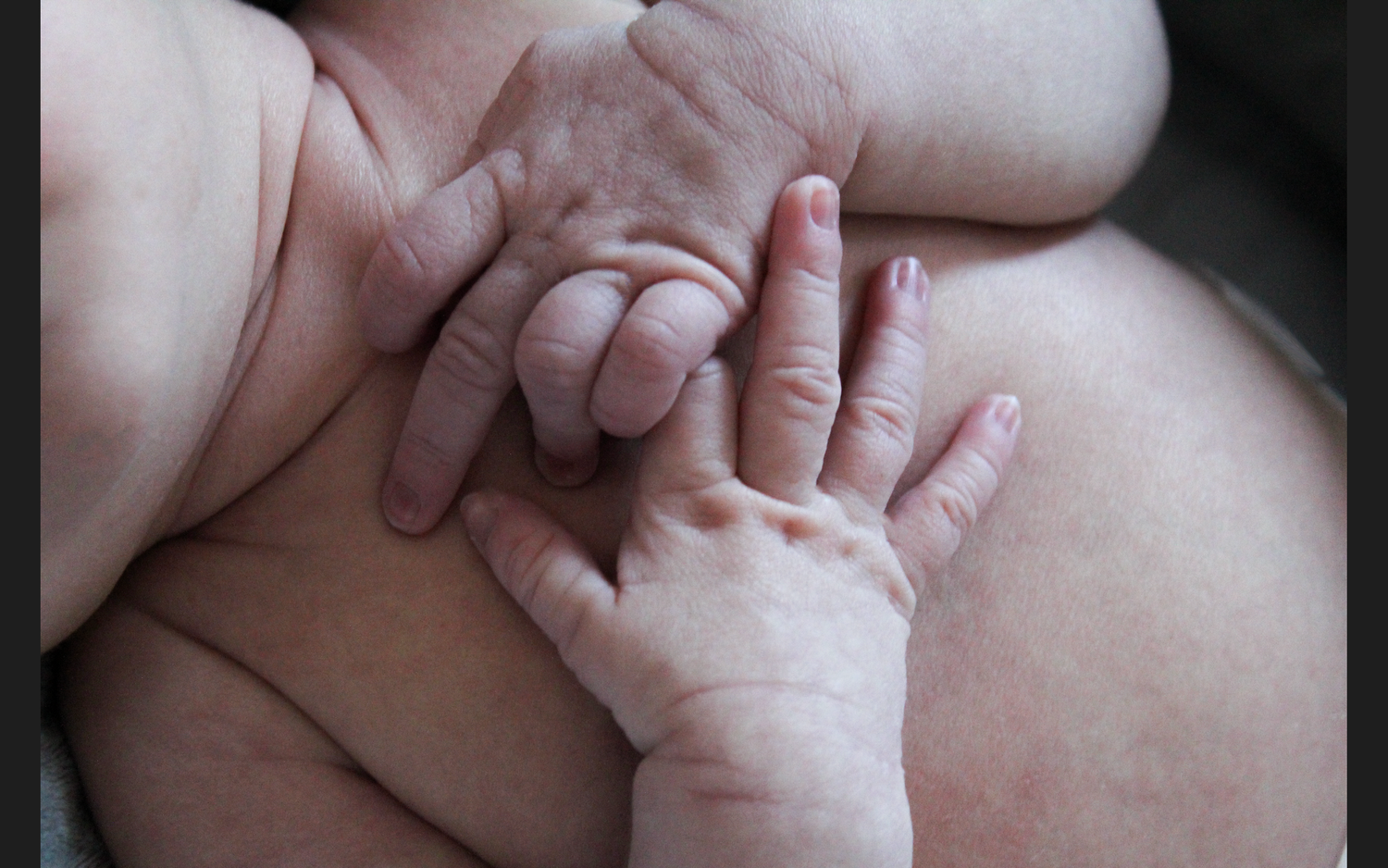 Series of close-up shots showing tender baby hand details.